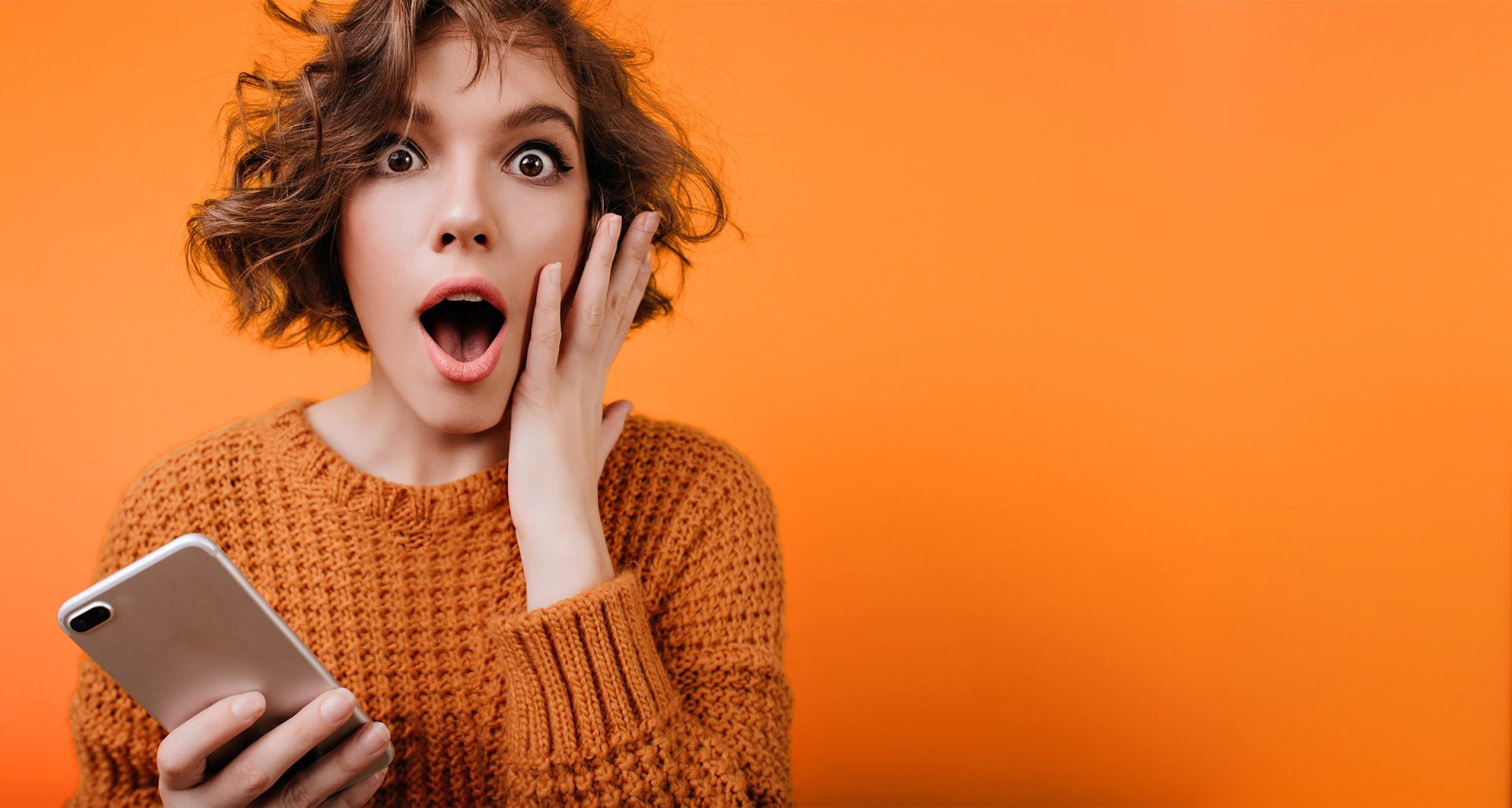 a close up of a black and brown abstract painting