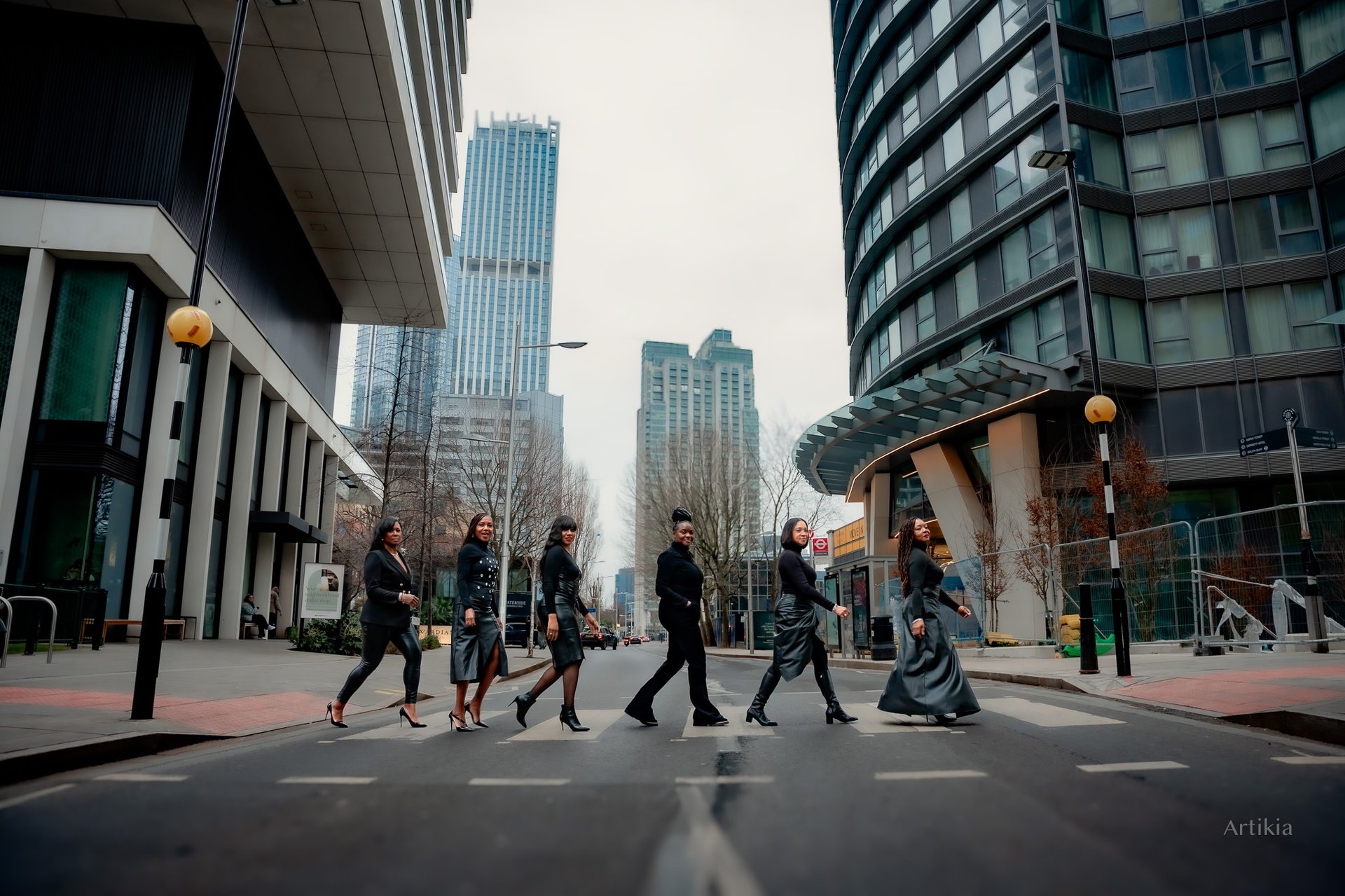 woman wearing yellow long-sleeved dress under white clouds and blue sky during daytime