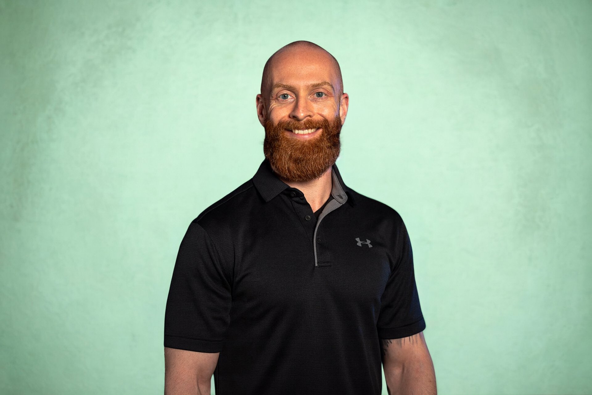 black and brown leather padded tub sofa