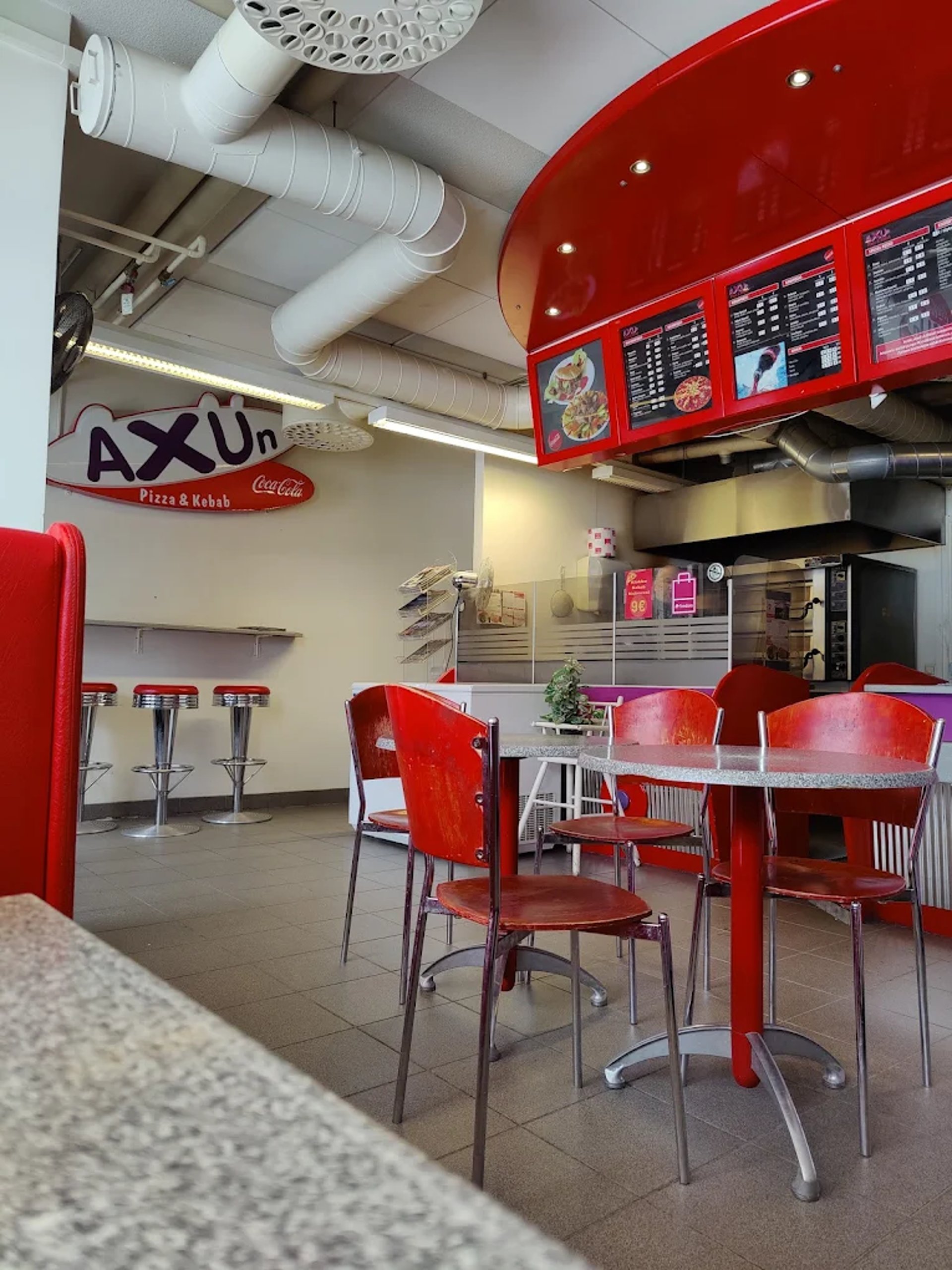 pizza on brown wooden table