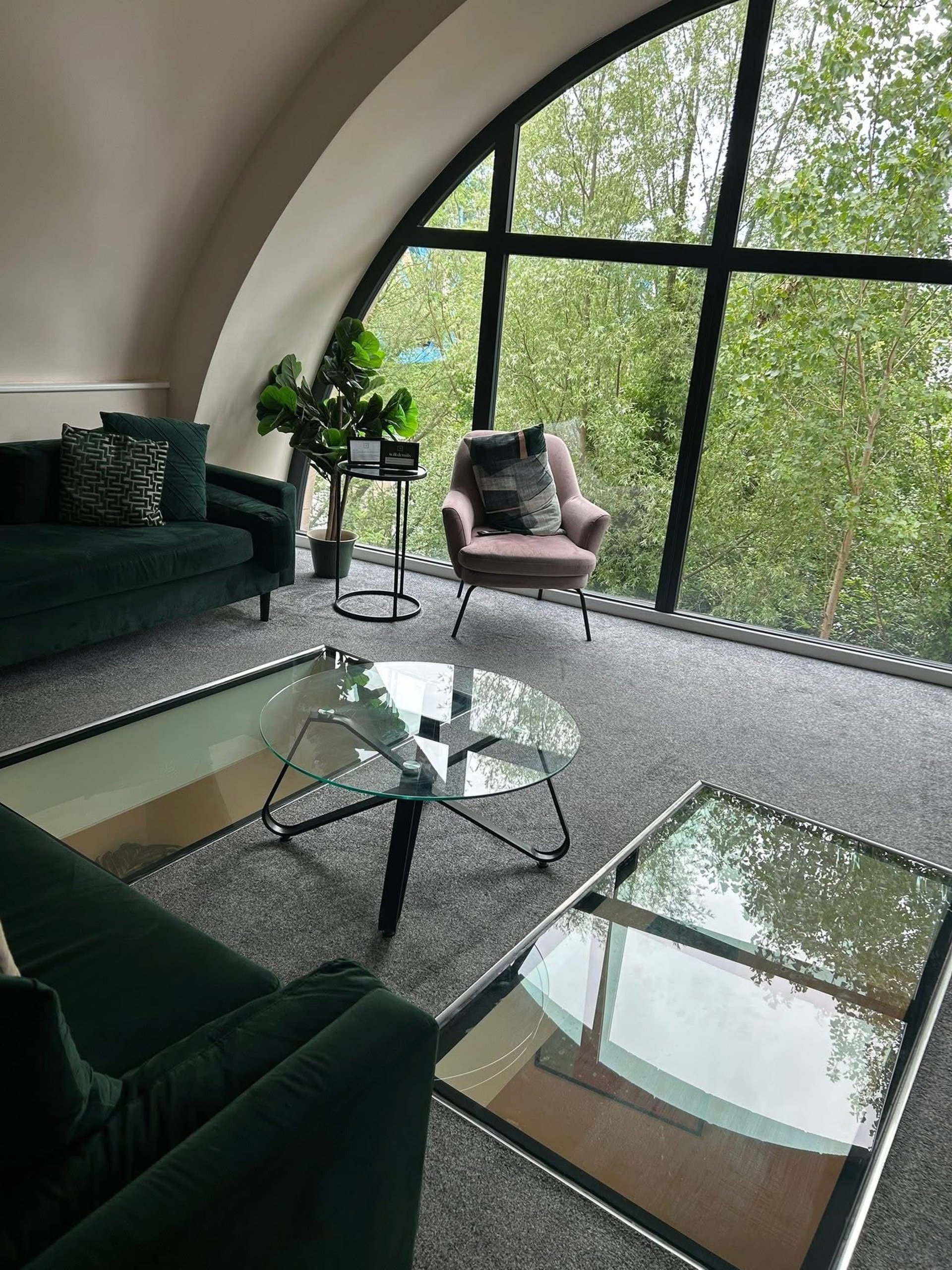 black and brown leather padded tub sofa