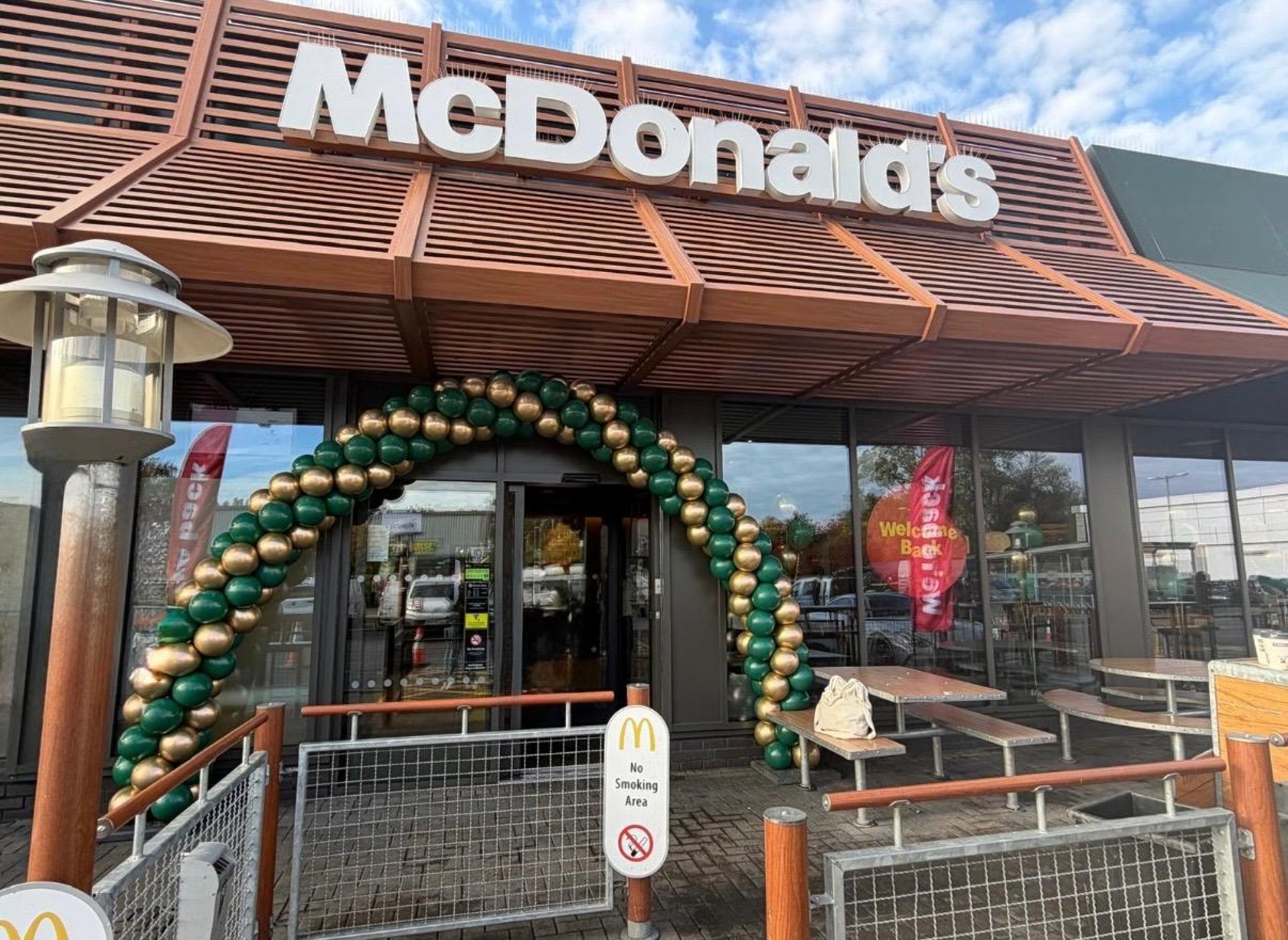 black and brown leather padded tub sofa