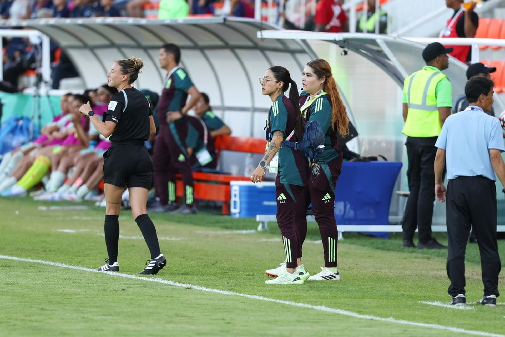 woman wearing yellow long-sleeved dress under white clouds and blue sky during daytime