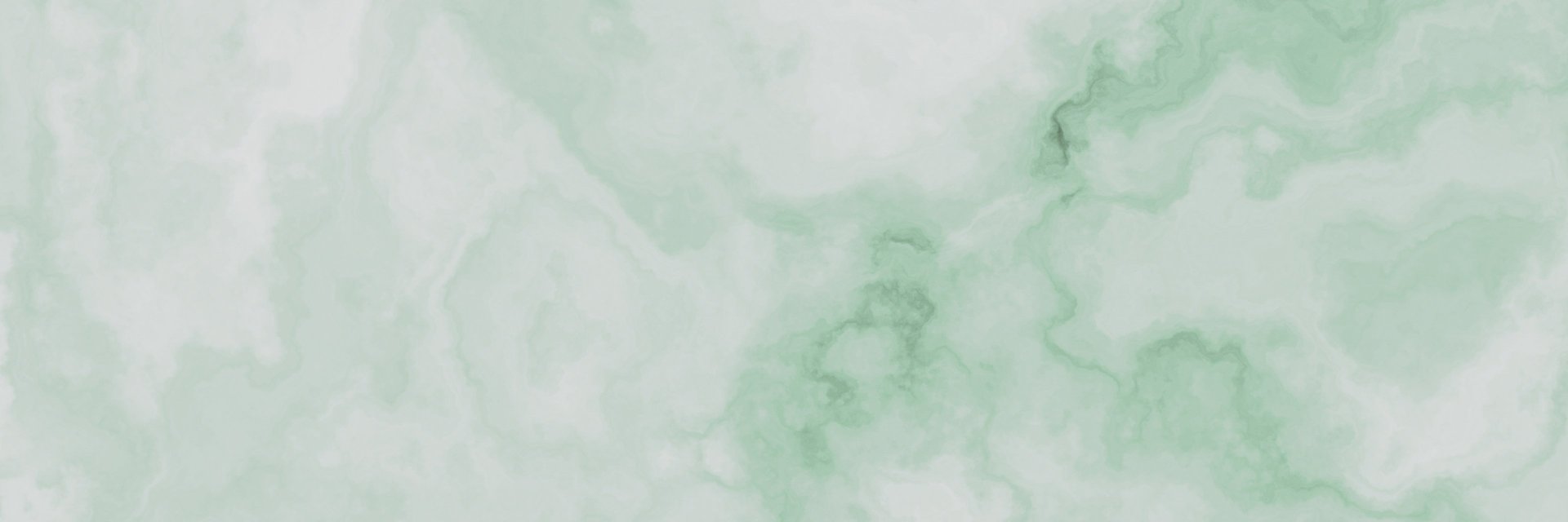 a large body of water under a cloudy sky