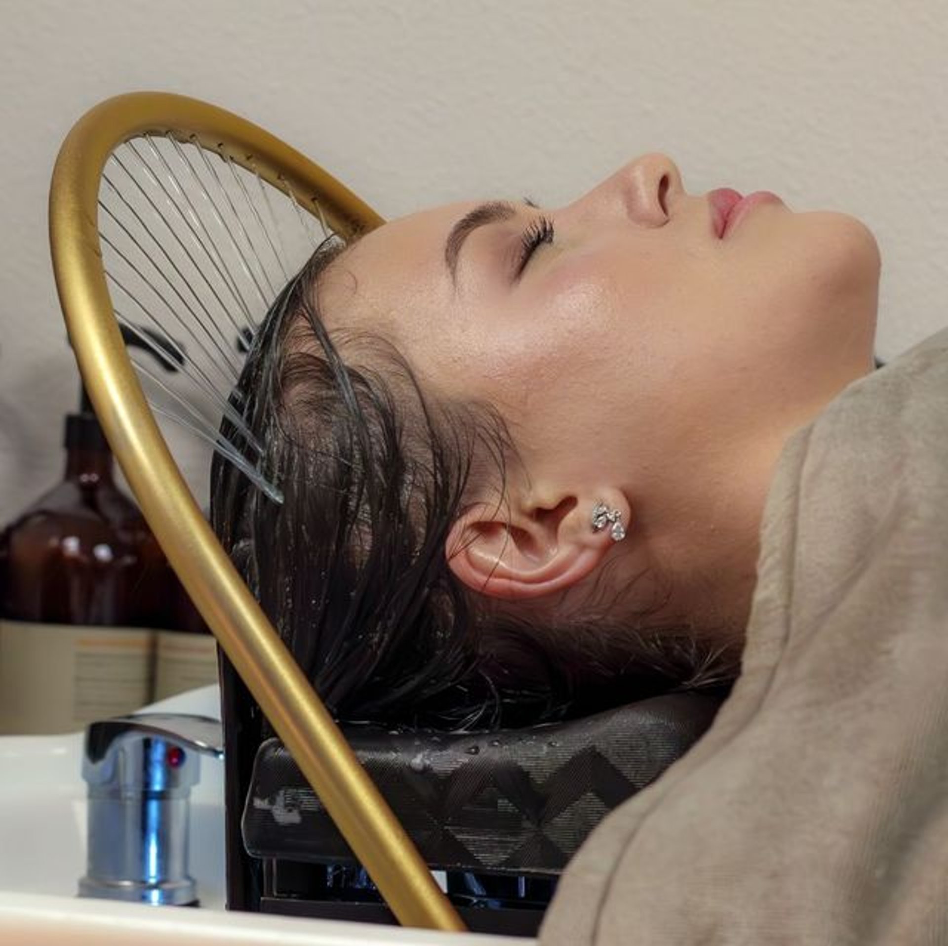 person in black leather gloves