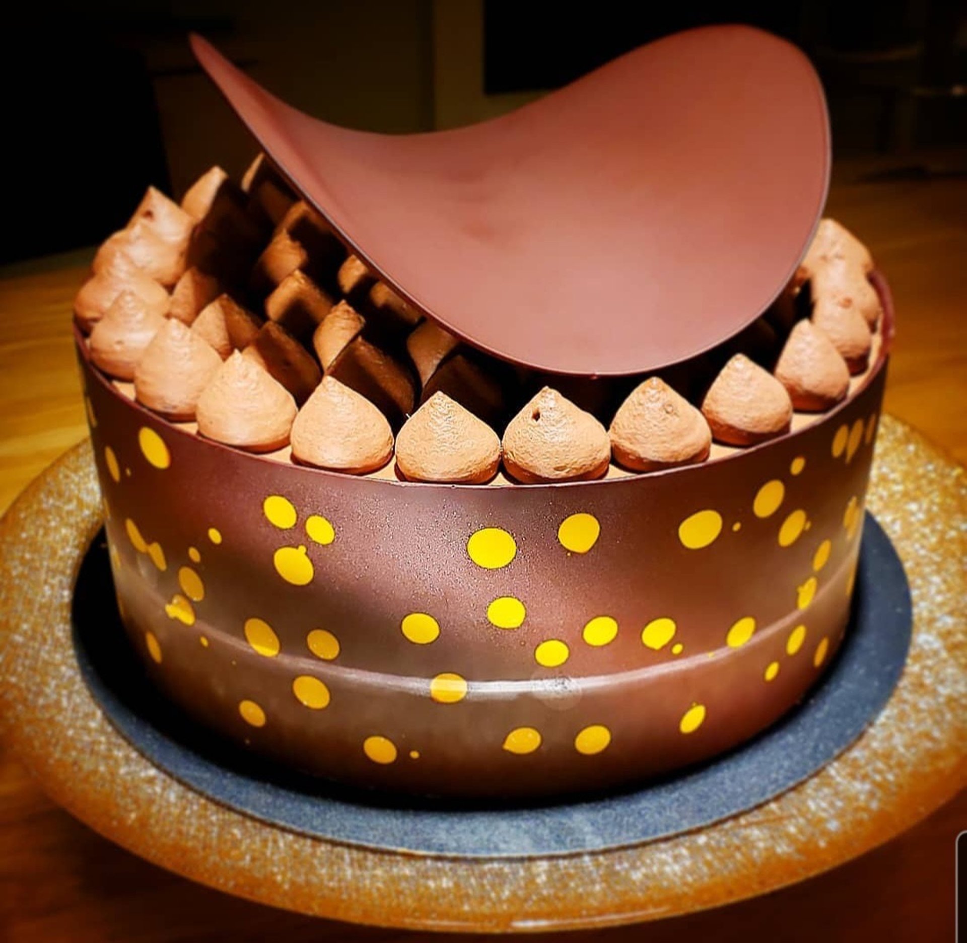 black and brown leather padded tub sofa