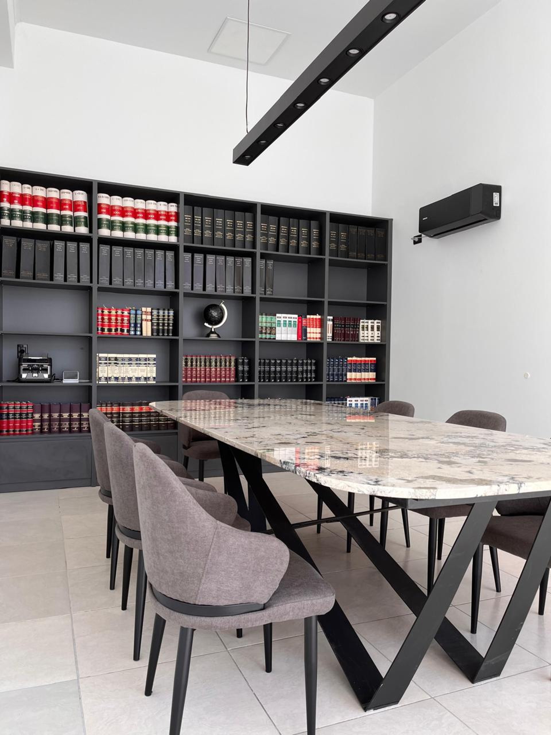 an abstract photo of a curved building with a blue sky in the background