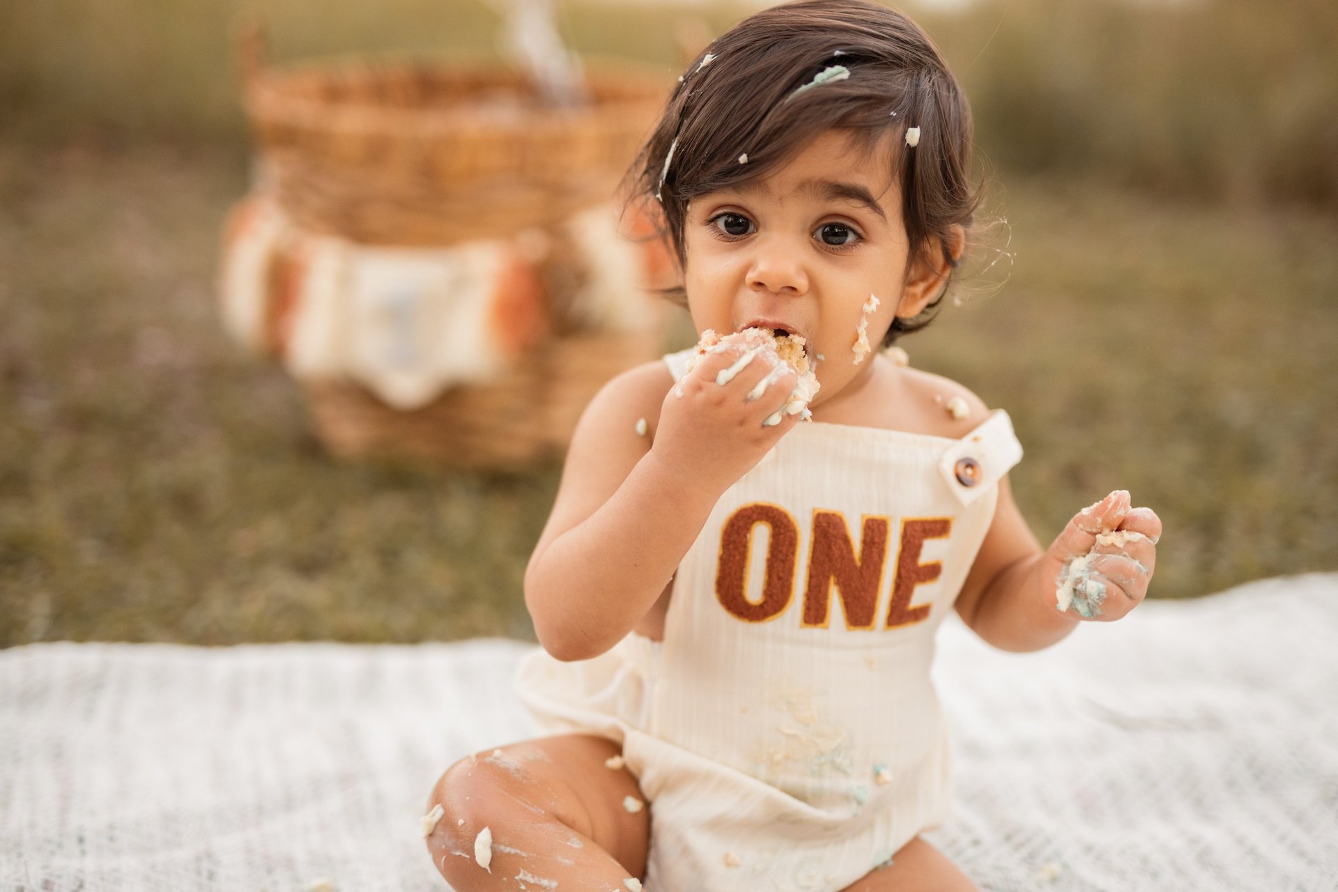 an abstract photo of a curved building with a blue sky in the background
