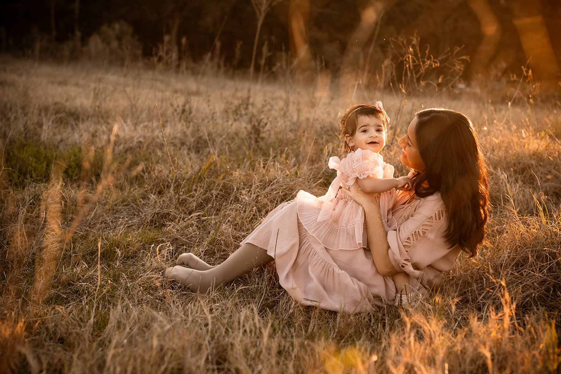 an abstract photo of a curved building with a blue sky in the background