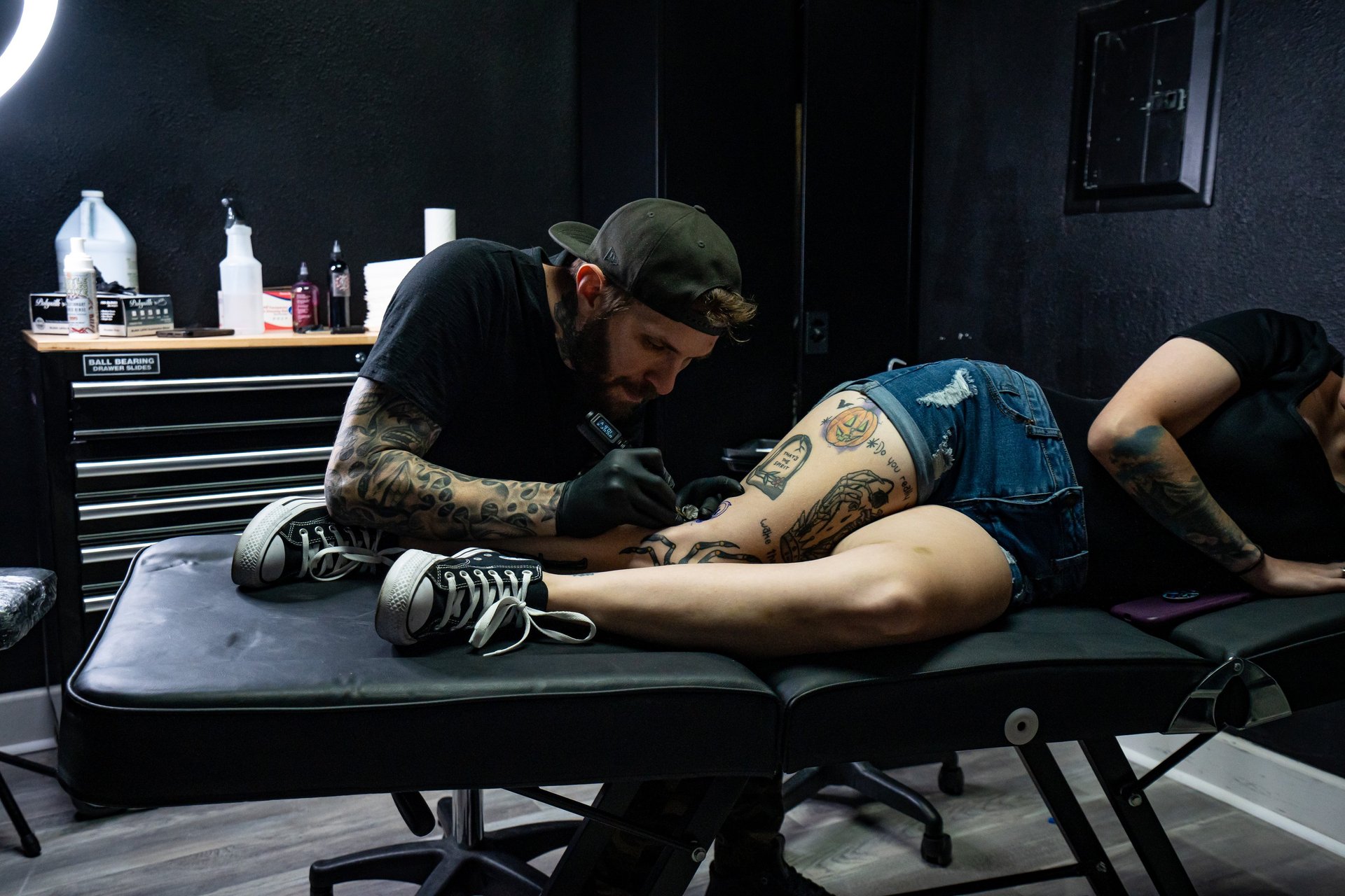 a man with a tattoo on his arm