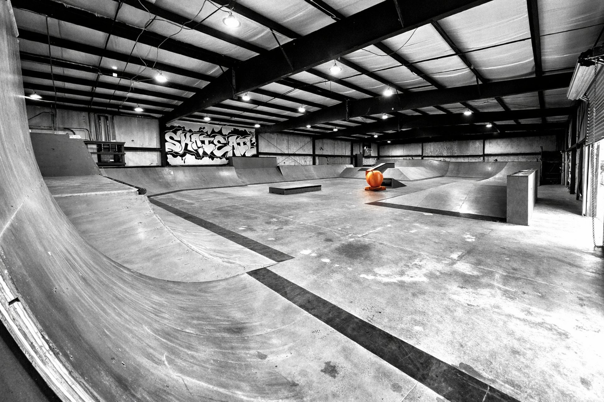 silhouette photography of skateboard ramps