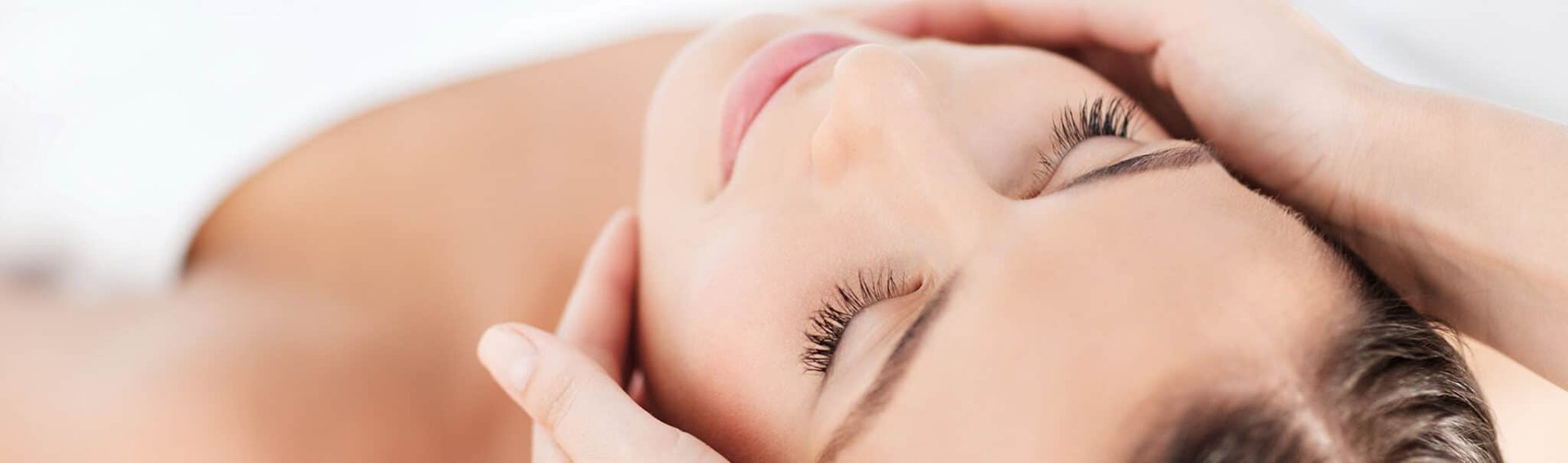 selective focus photography of white clustered flowers on left human hand