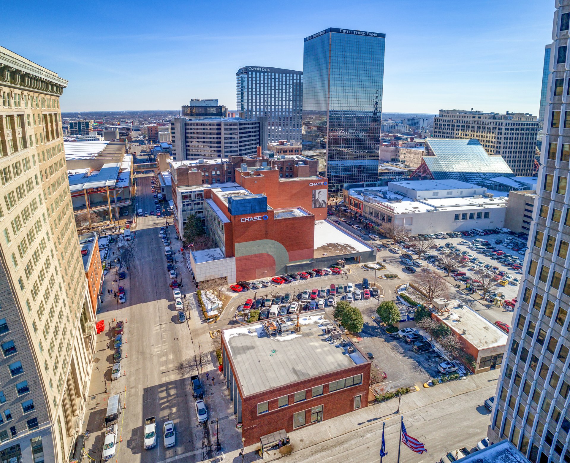 black and brown leather padded tub sofa