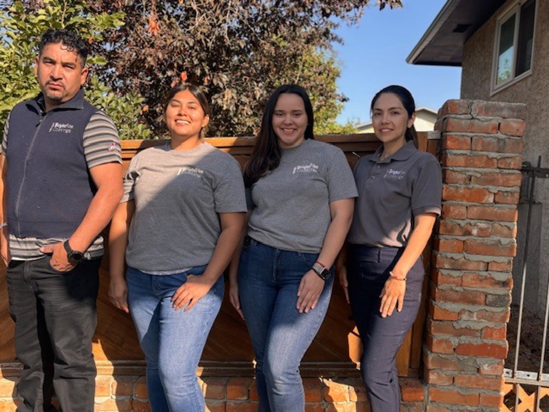 an aerial view of a stadium with a city in the background