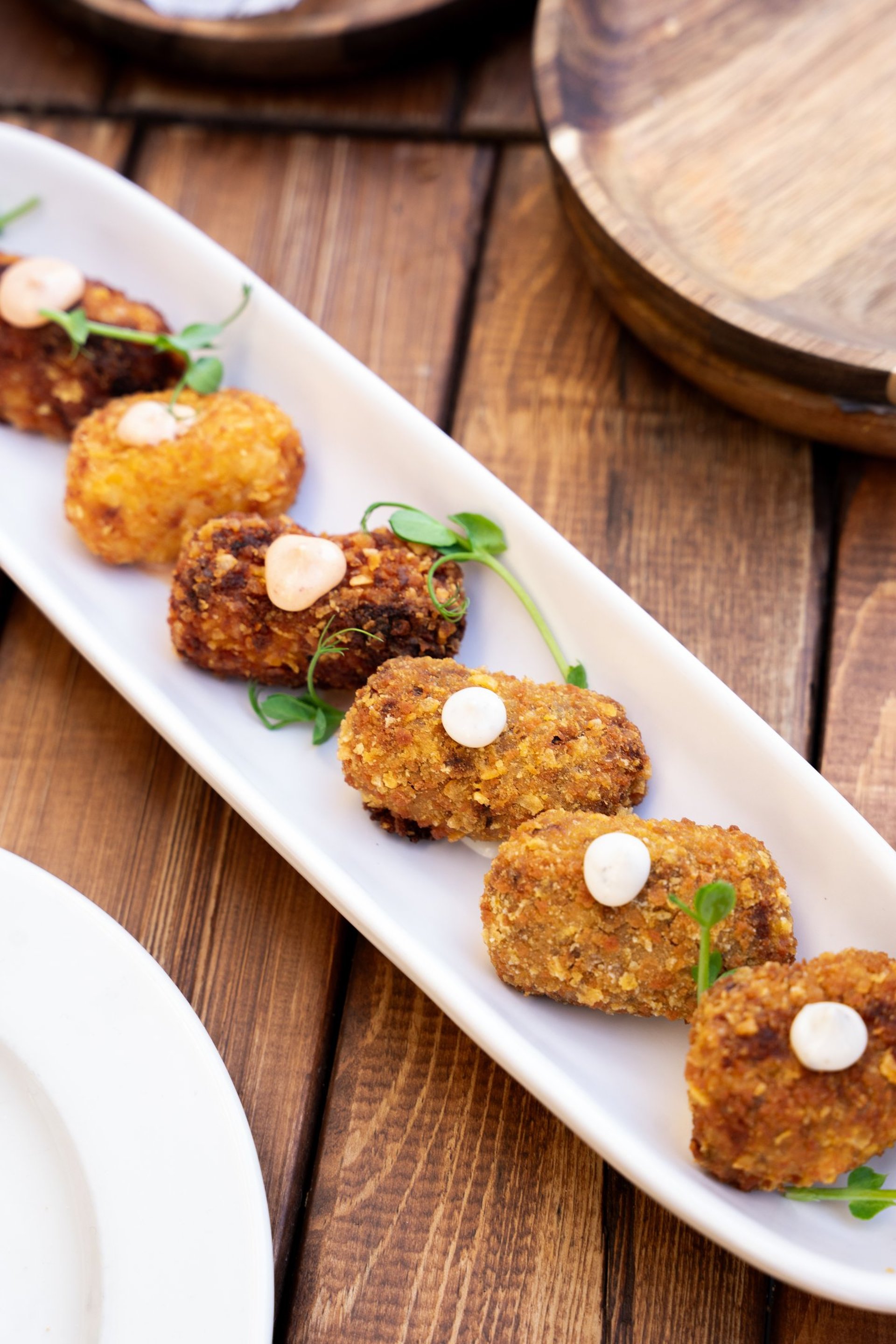 an abstract photo of a curved building with a blue sky in the background