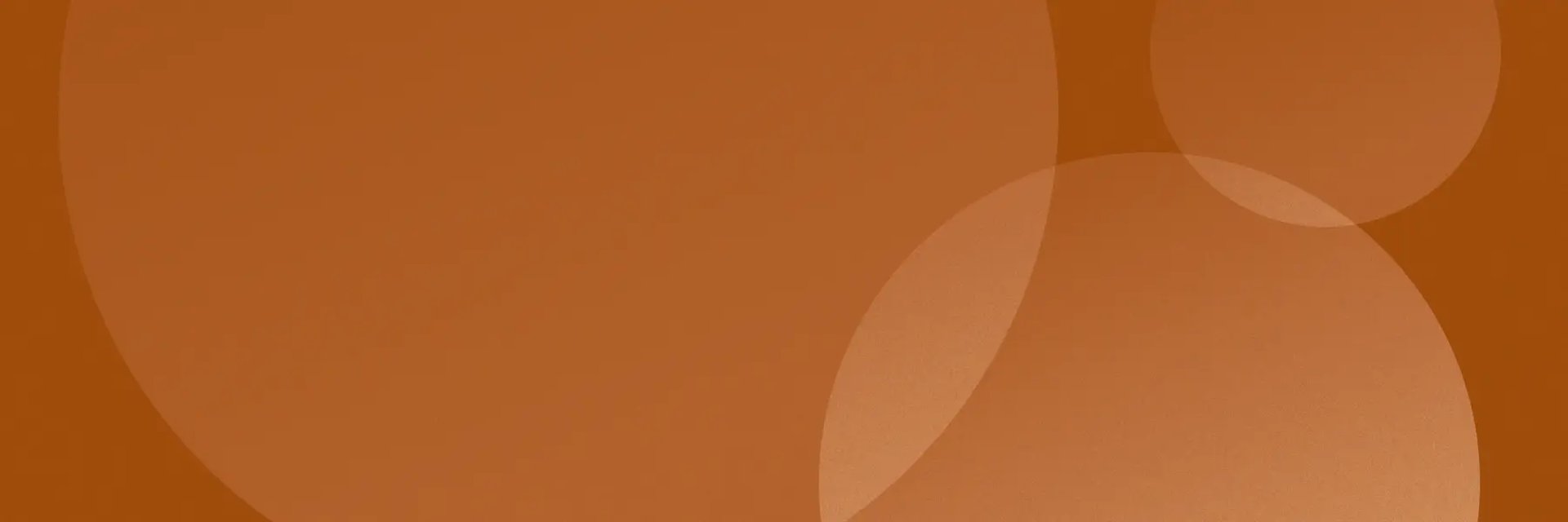 imagen abstracta, fondo cobrizos y círculos aleatorios en transparencia