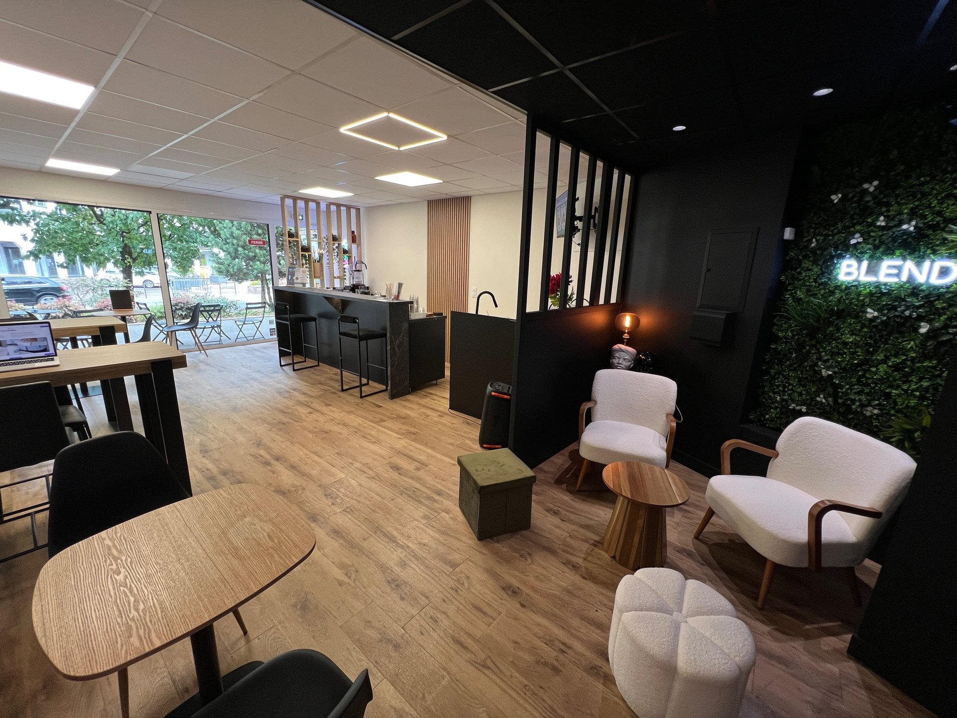 an abstract photo of a curved building with a blue sky in the background