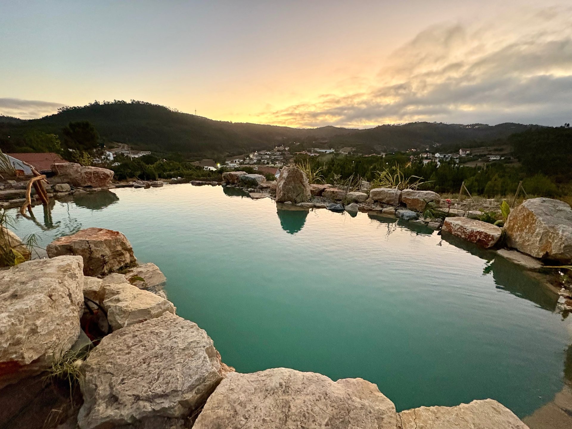 an abstract photo of a curved building with a blue sky in the background