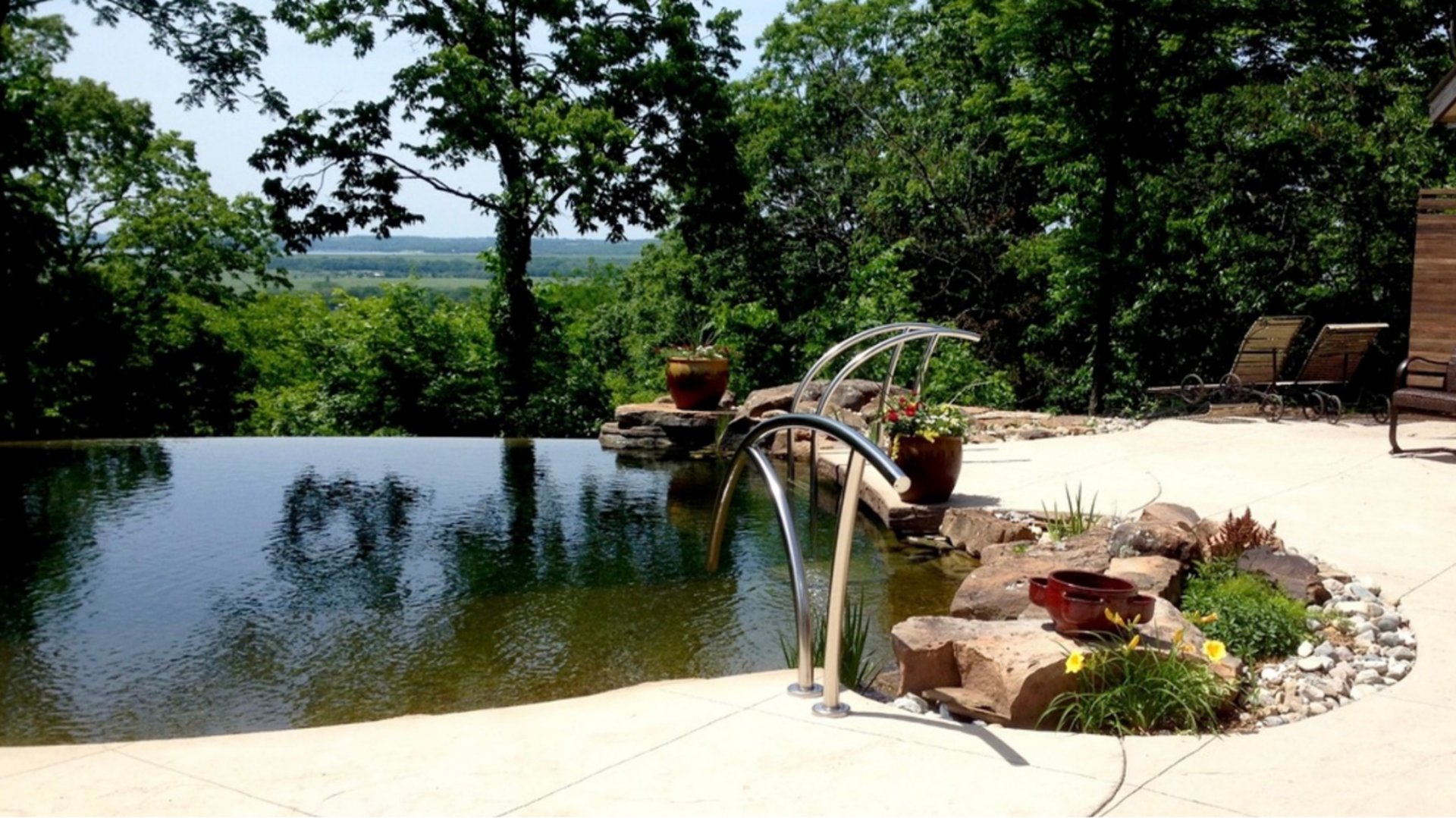 an abstract photo of a curved building with a blue sky in the background