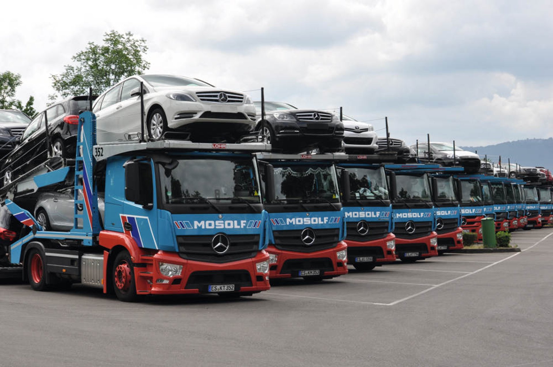 an abstract photo of a curved building with a blue sky in the background