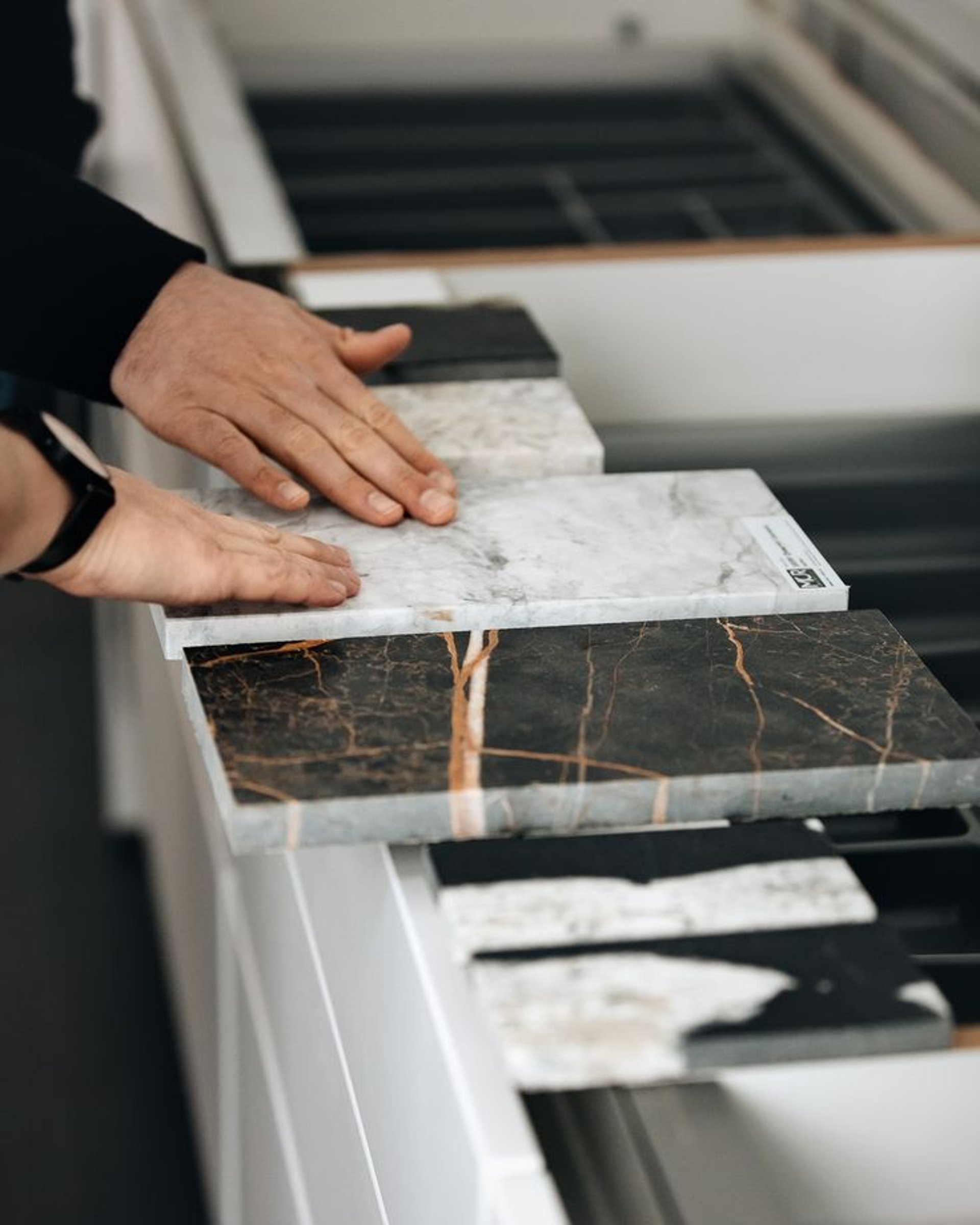 an abstract photo of a curved building with a blue sky in the background