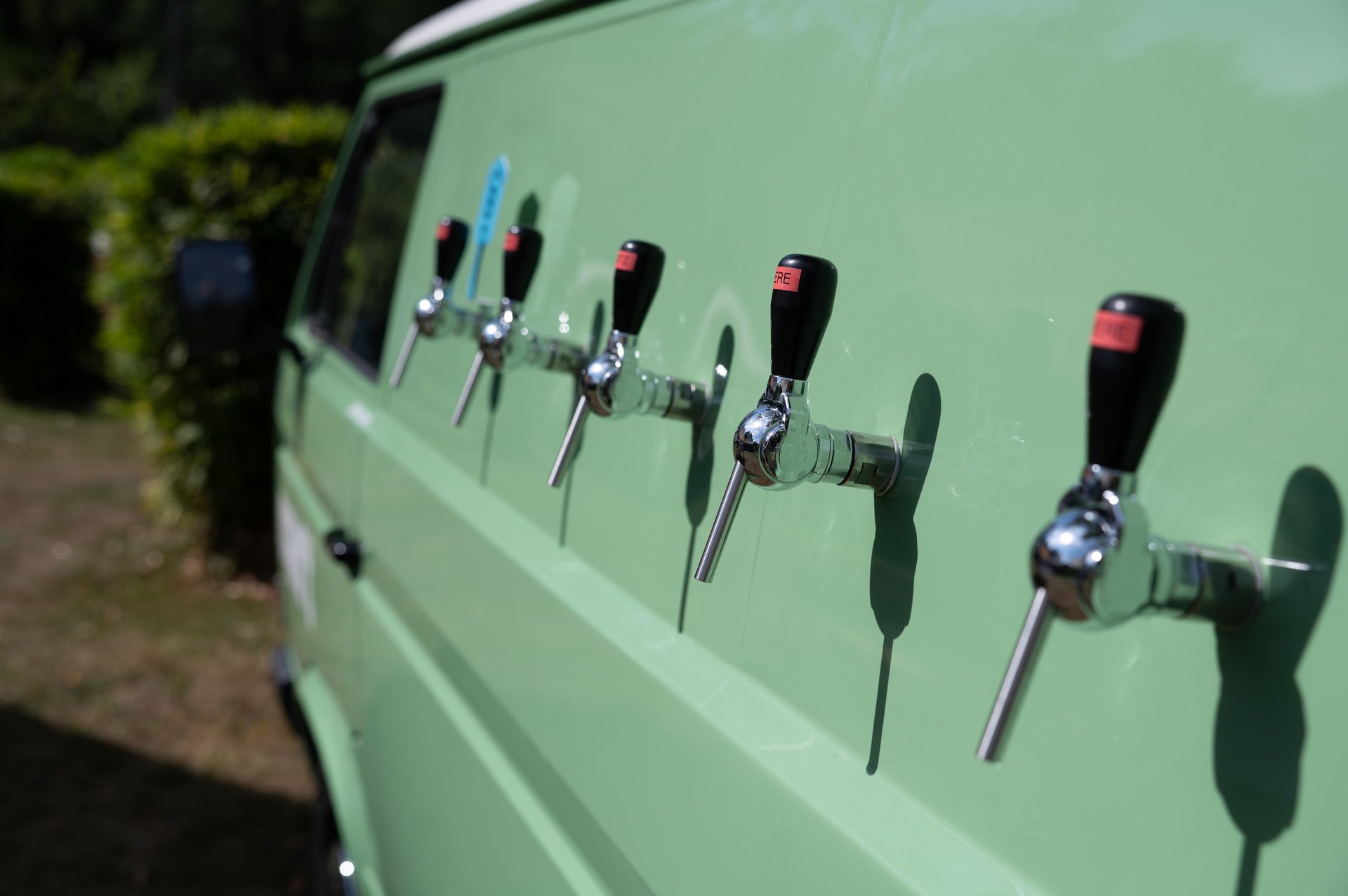 an abstract photo of a curved building with a blue sky in the background