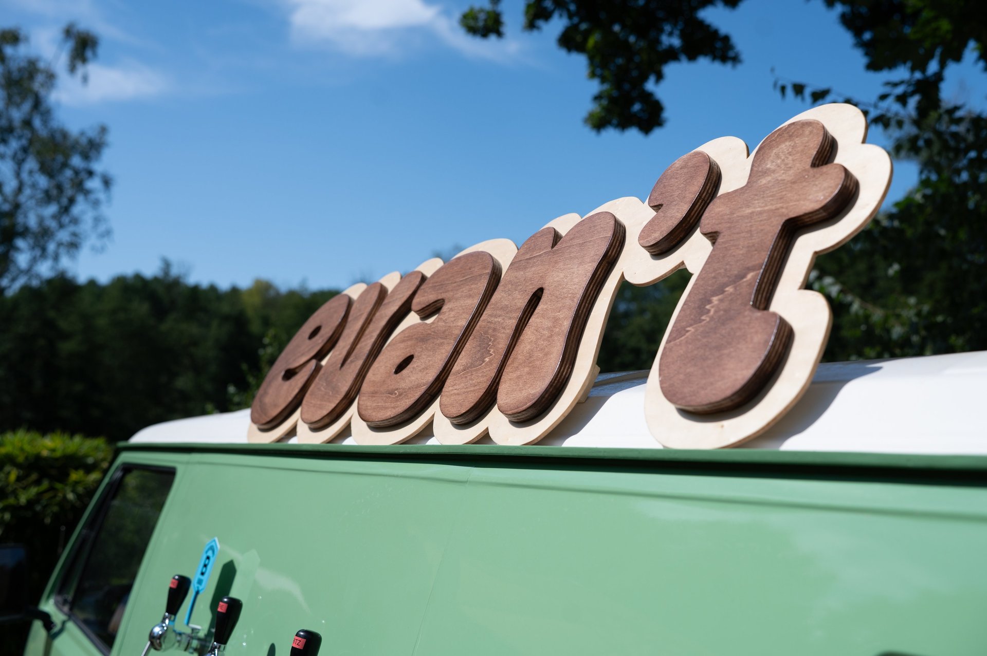 black and brown leather padded tub sofa