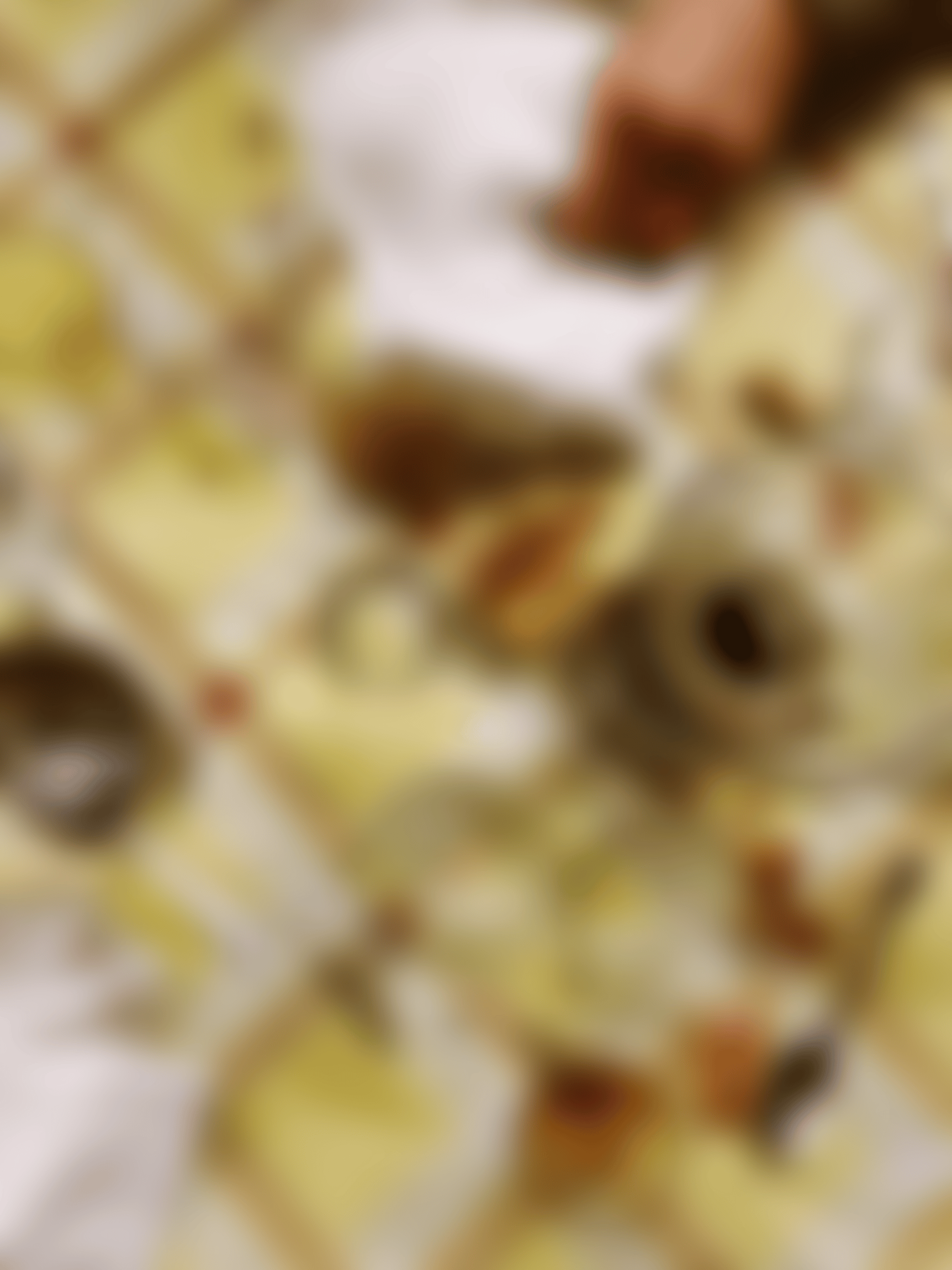 a close up of a black and brown abstract painting