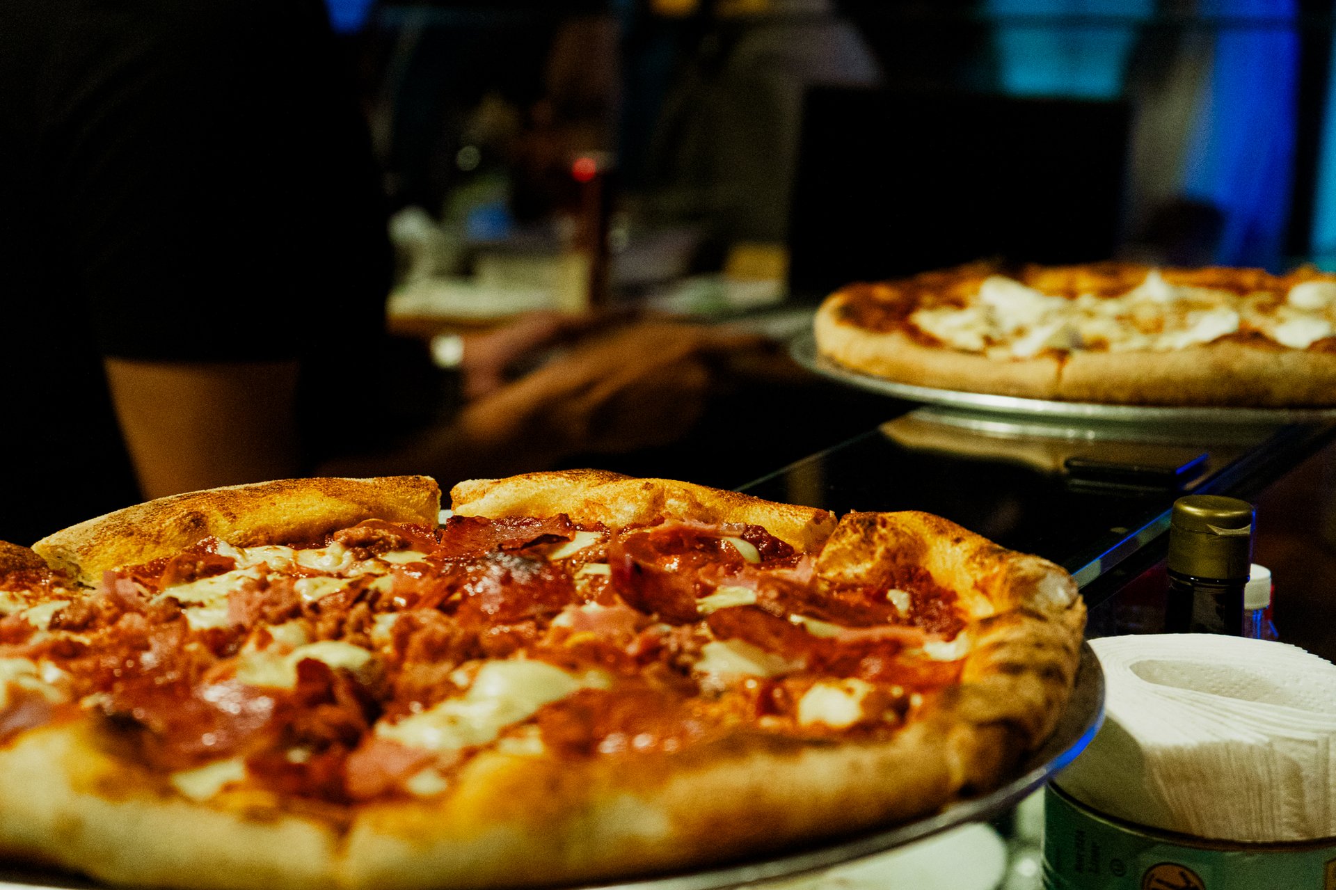 black and brown leather padded tub sofa