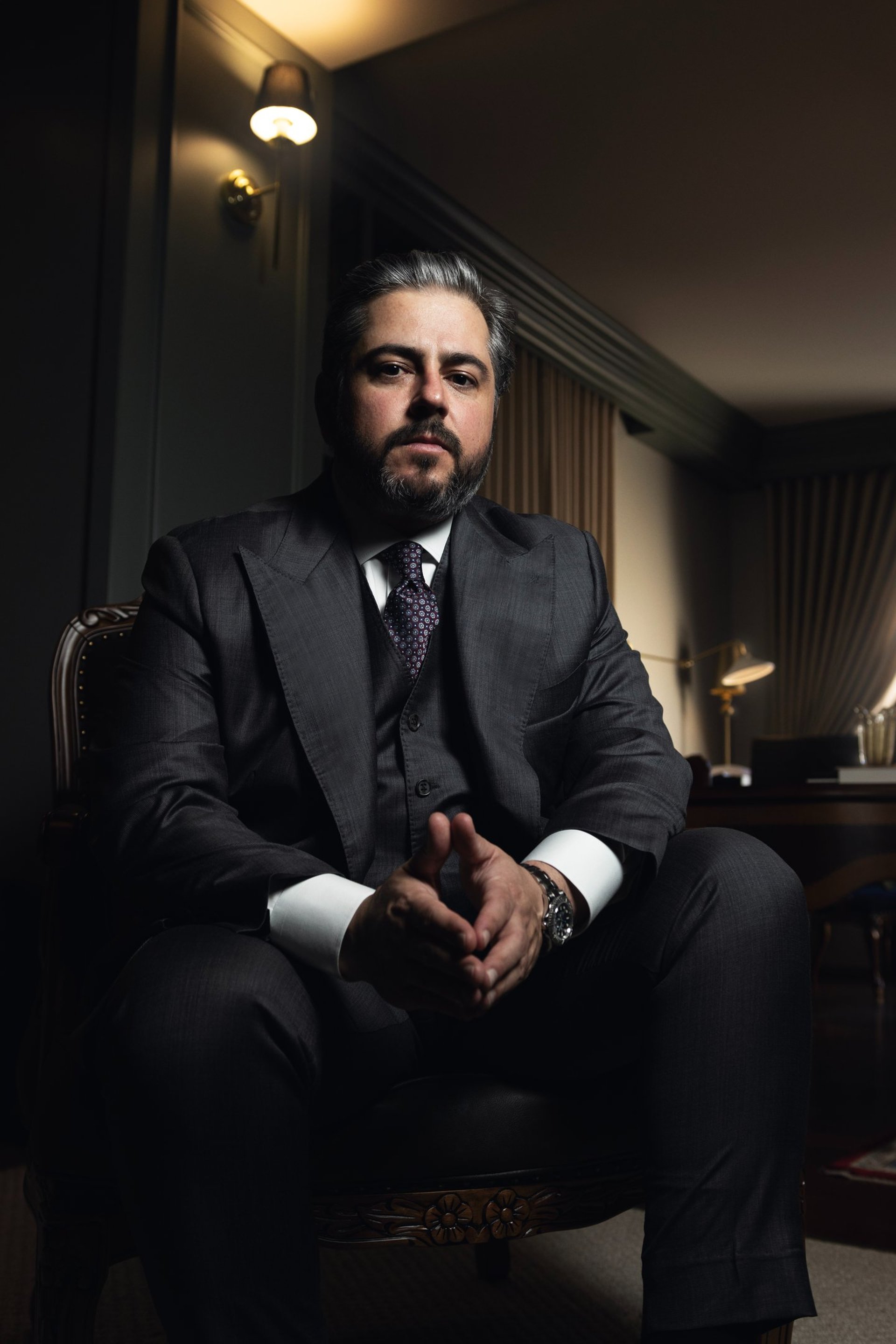 an abstract photo of a curved building with a blue sky in the background