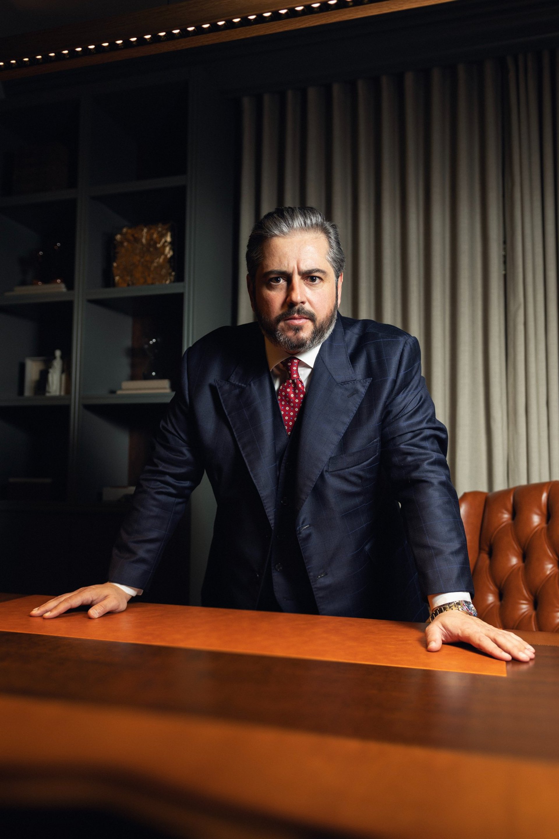 an abstract photo of a curved building with a blue sky in the background