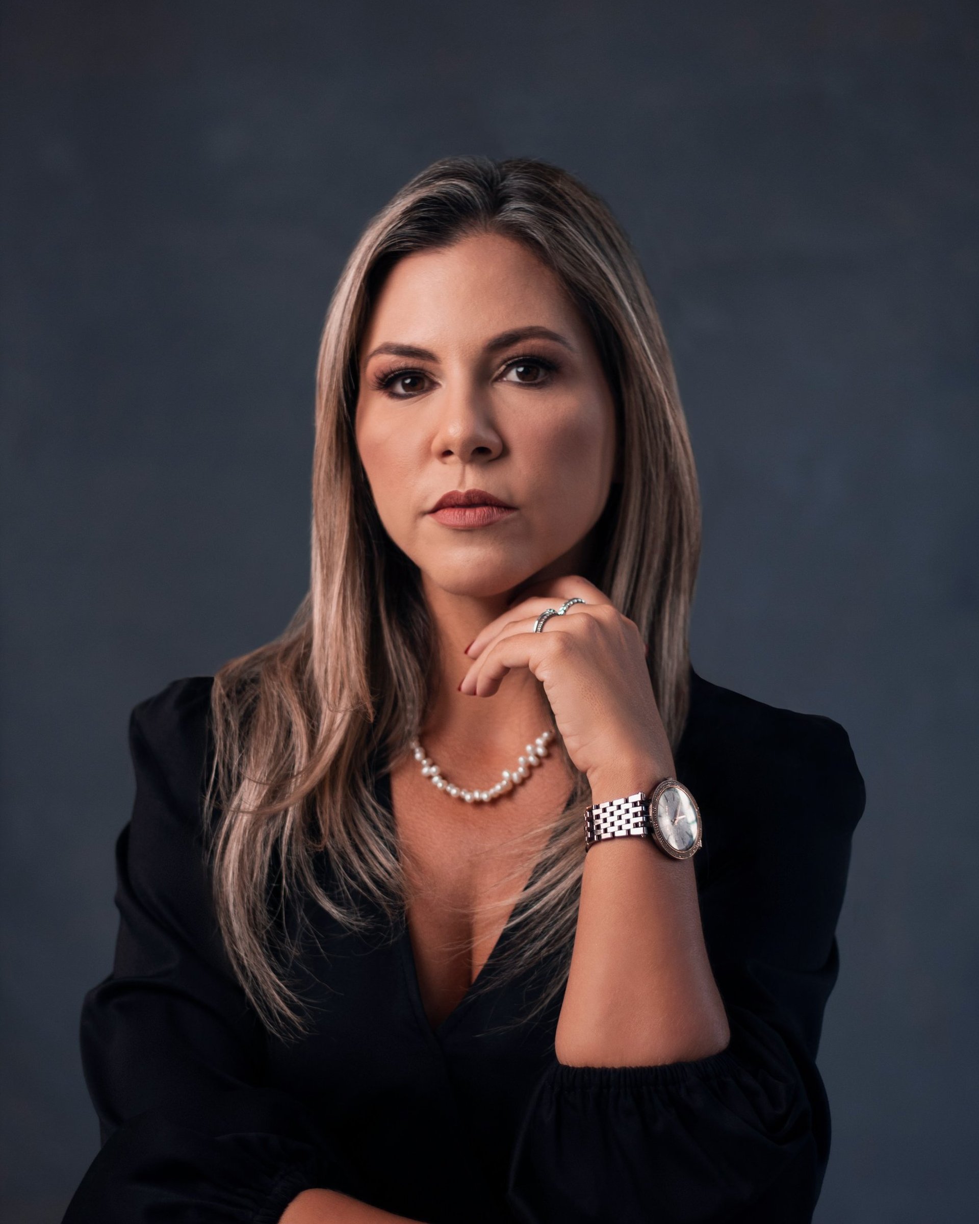 an abstract photo of a curved building with a blue sky in the background