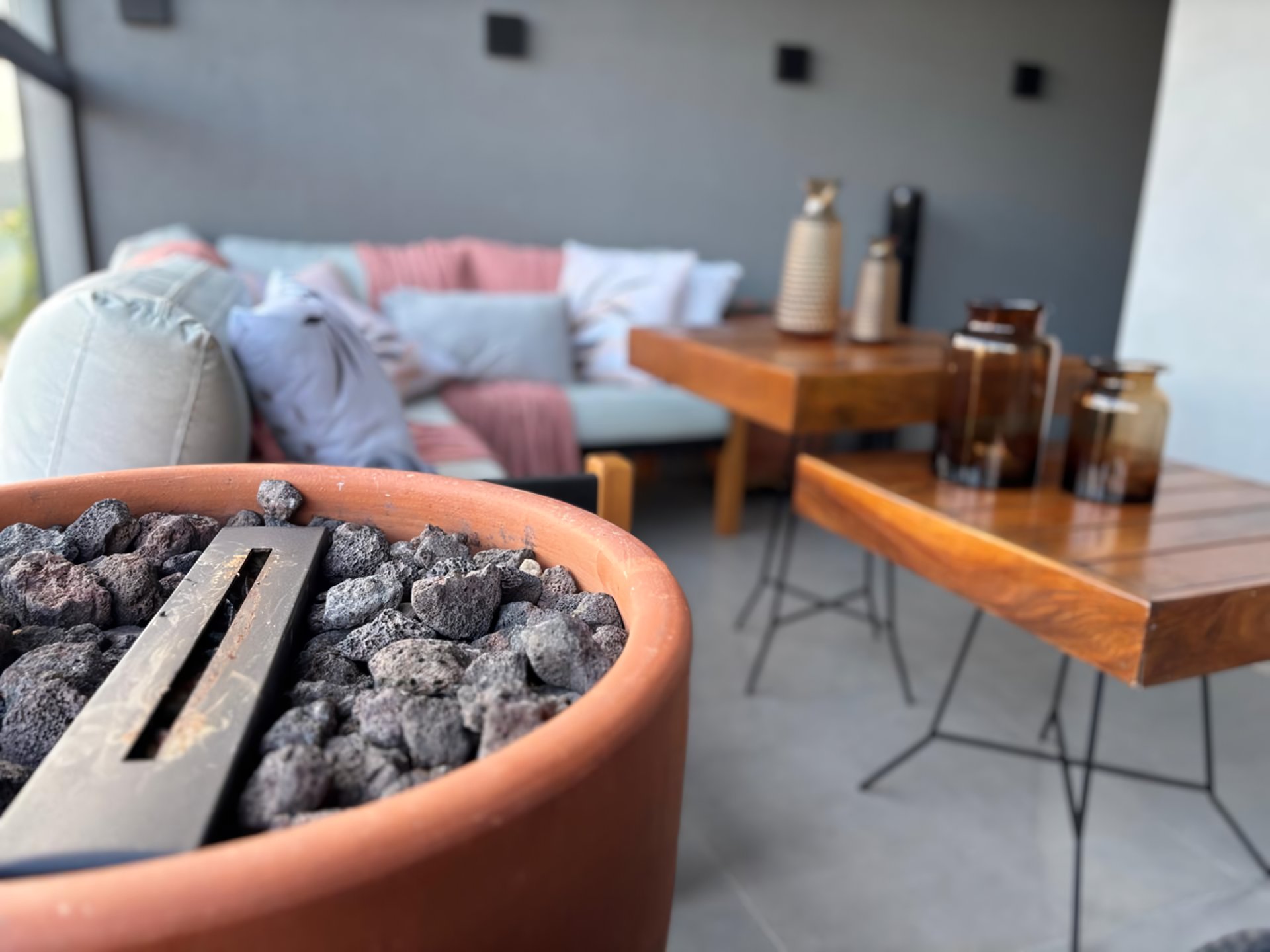 an abstract photo of a curved building with a blue sky in the background