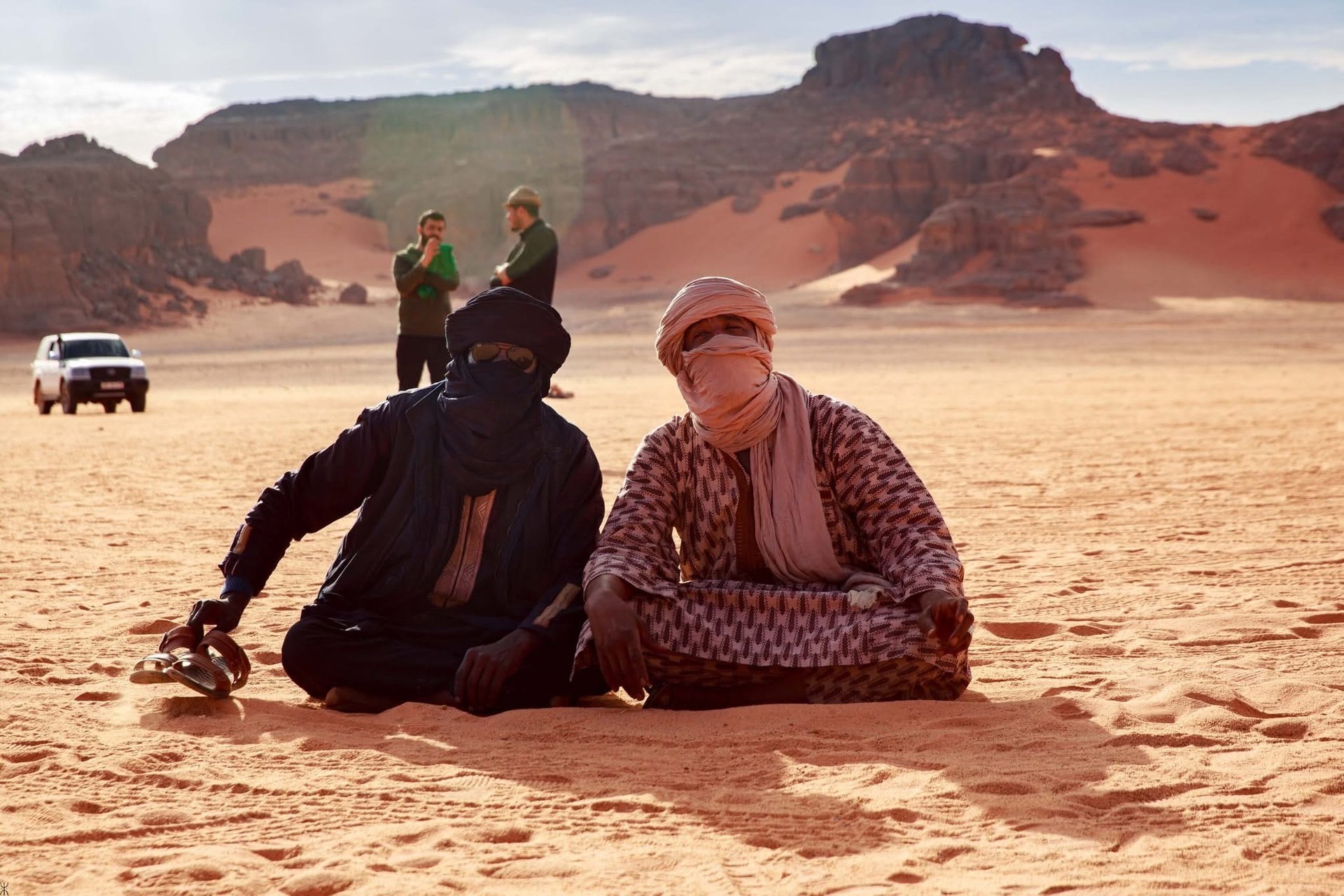 an abstract photo of a curved building with a blue sky in the background