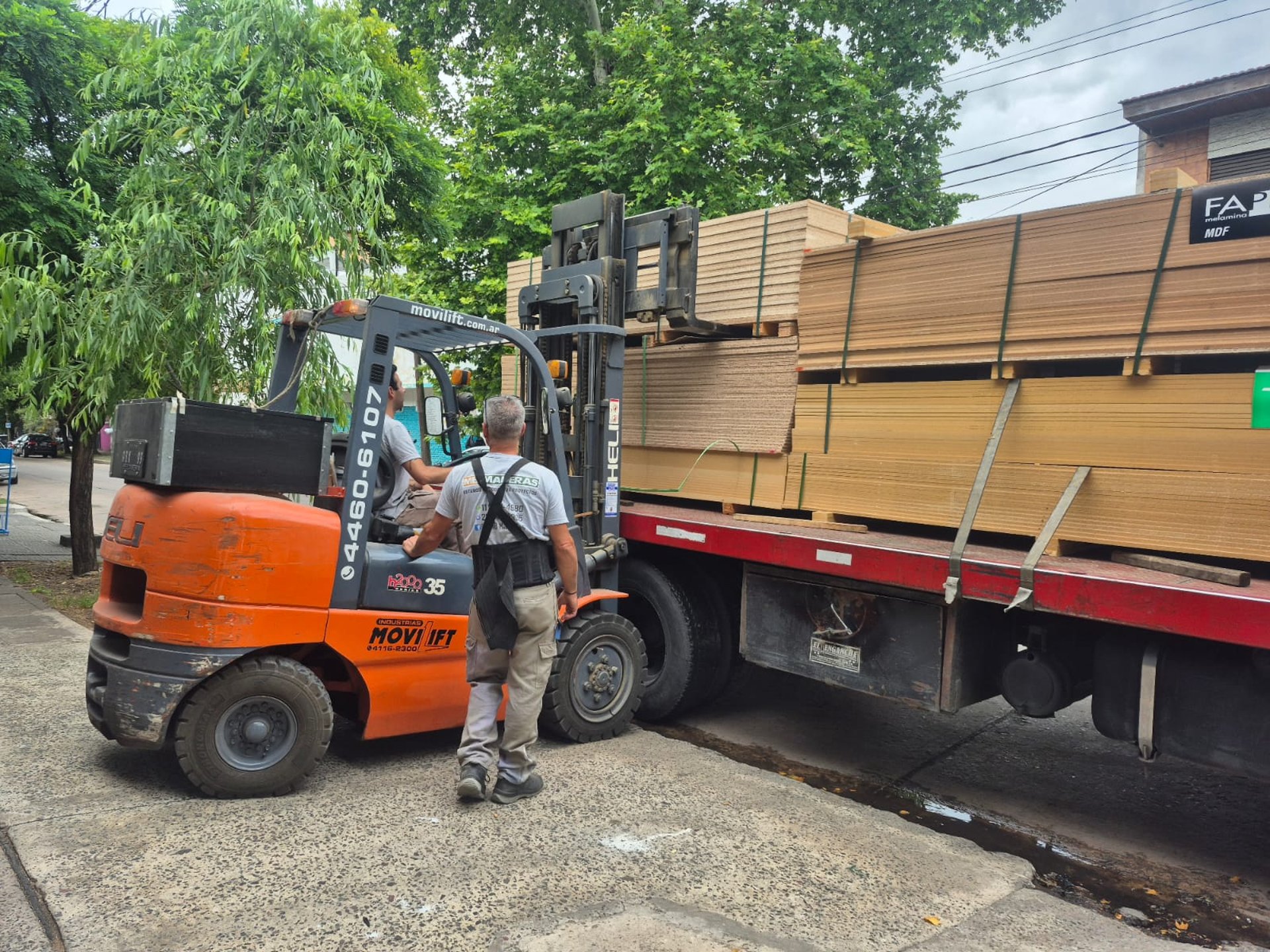an abstract photo of a curved building with a blue sky in the background