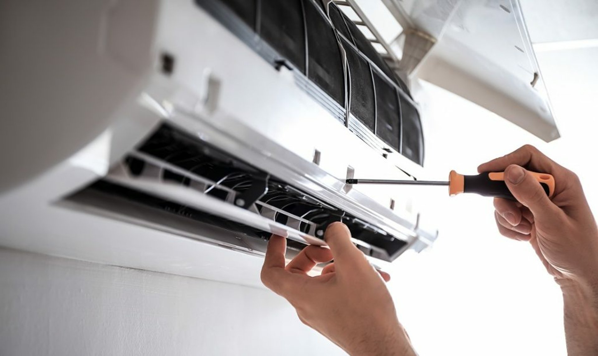 an abstract photo of a curved building with a blue sky in the background