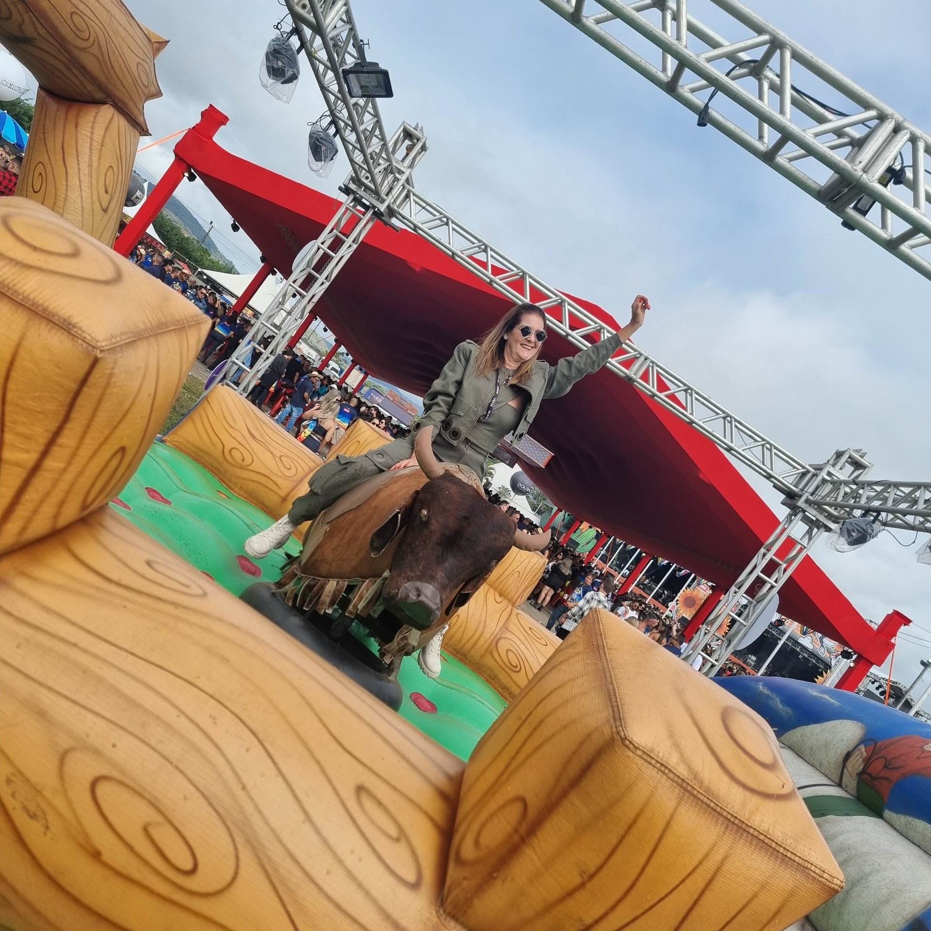 woman wearing yellow long-sleeved dress under white clouds and blue sky during daytime
