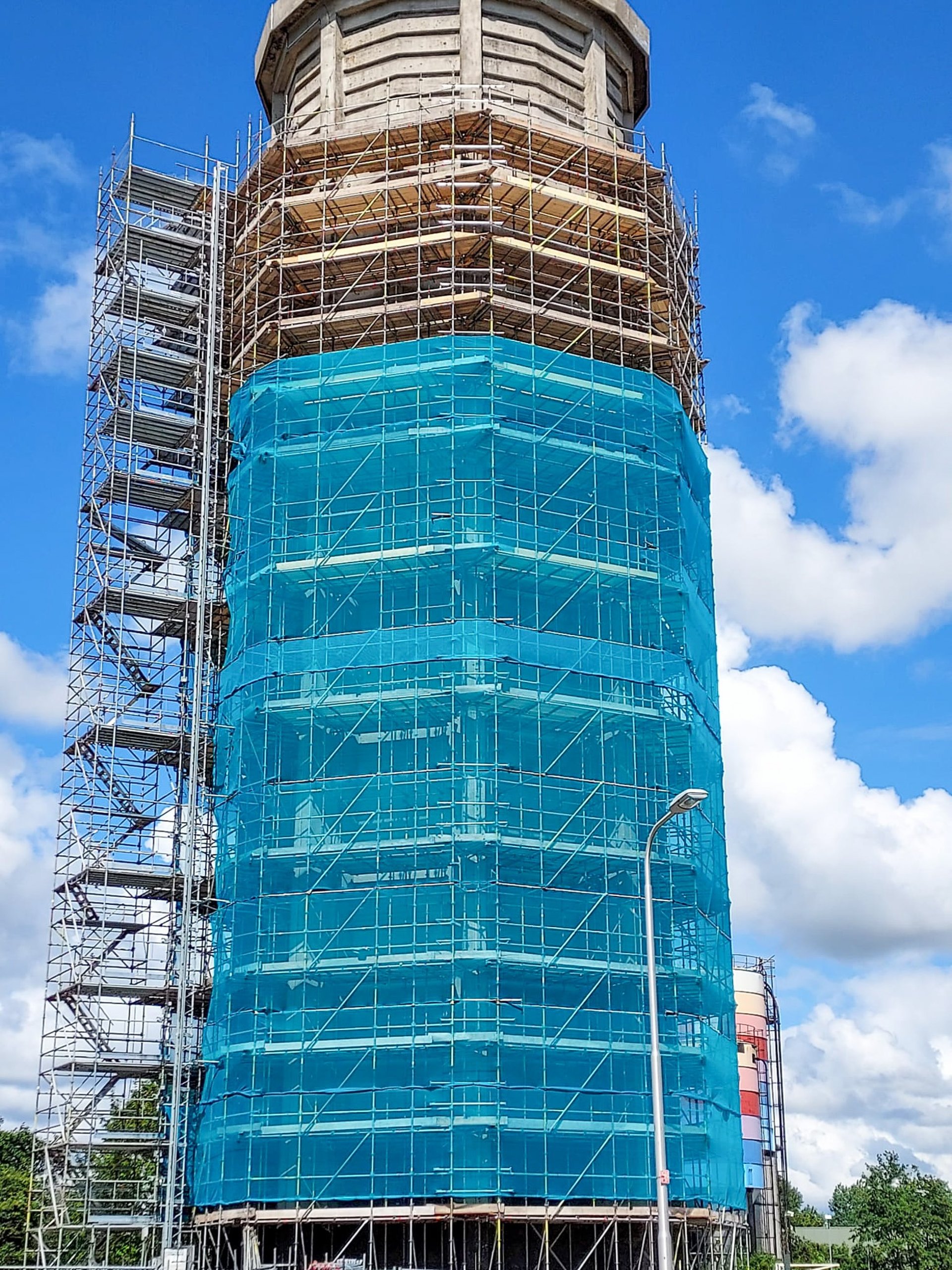 black and brown leather padded tub sofa
