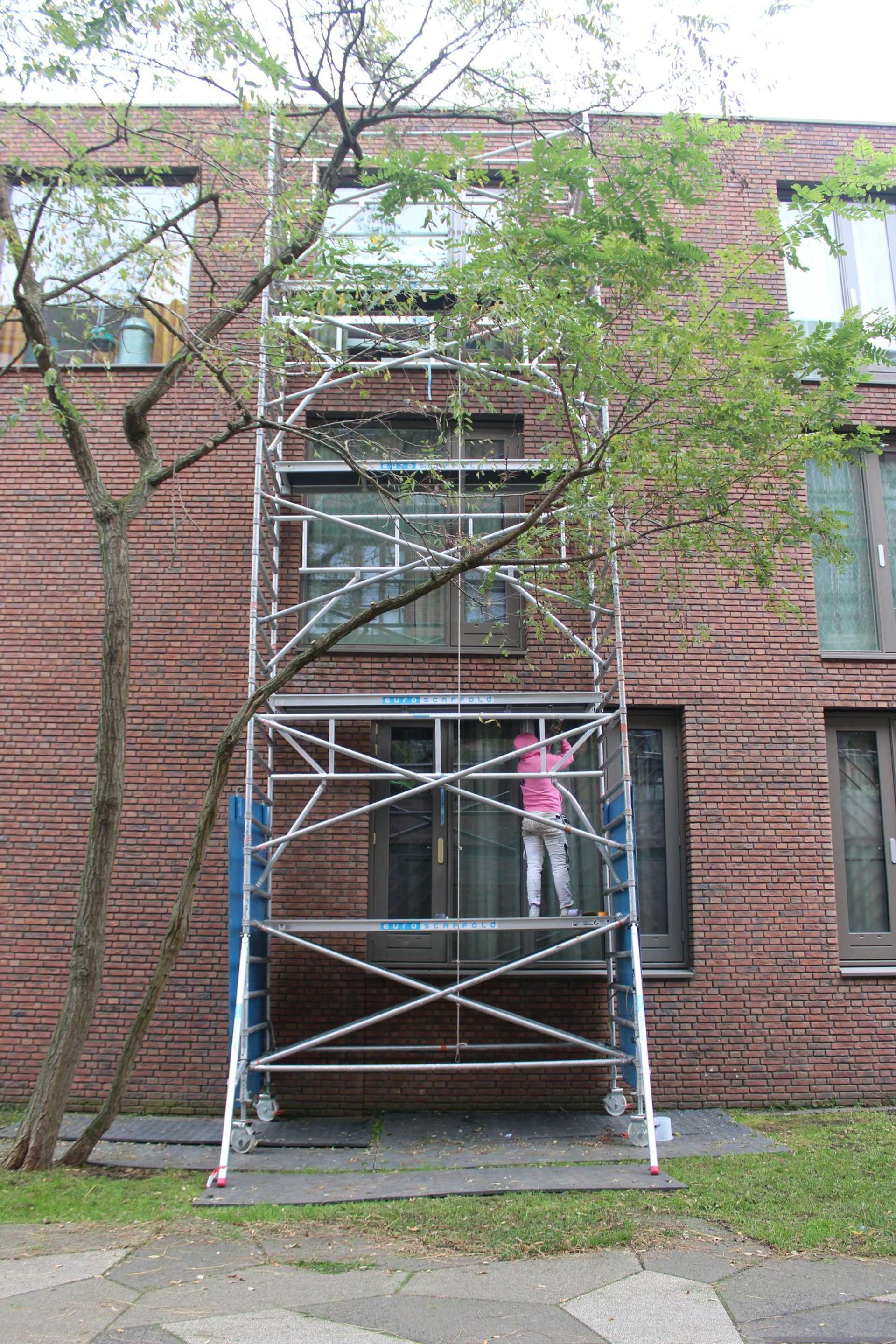 black and brown leather padded tub sofa