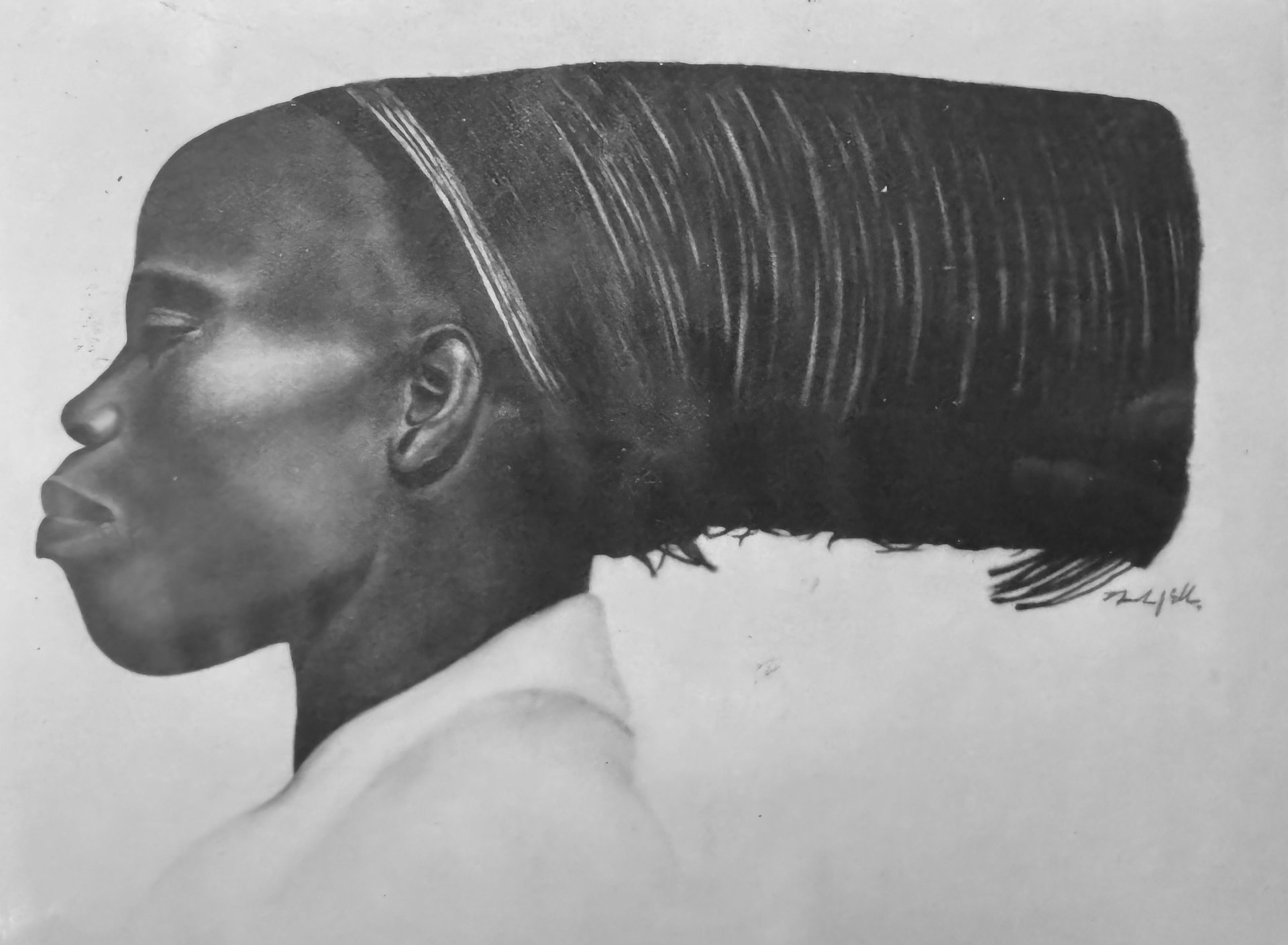 an abstract photo of a curved building with a blue sky in the background