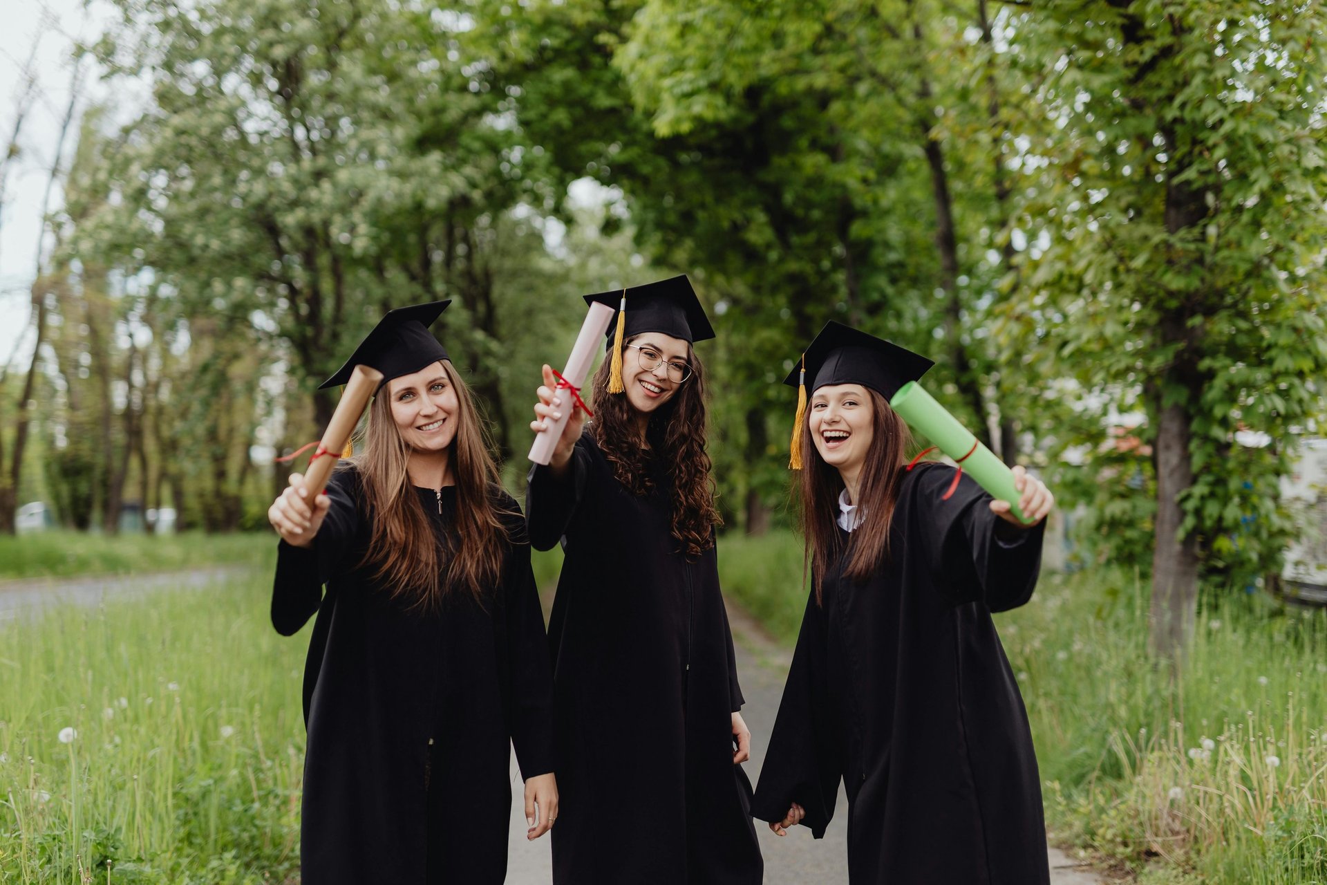 a group of people wearing graduation gowns