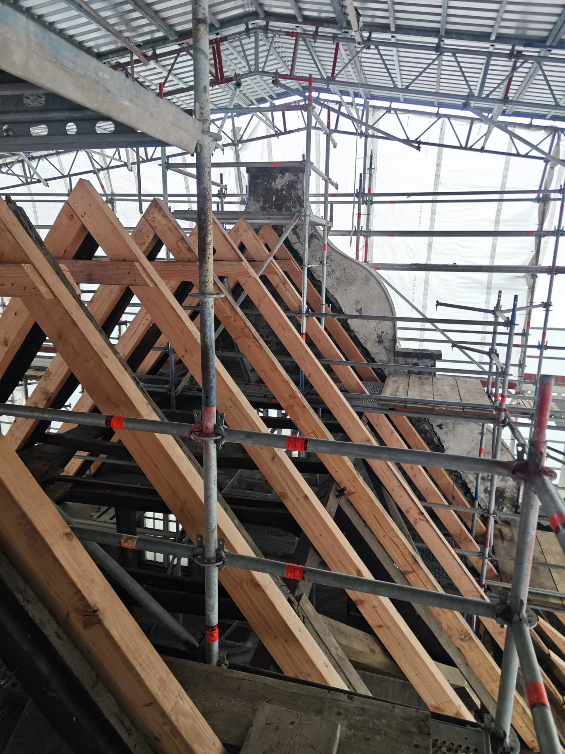 black and brown leather padded tub sofa
