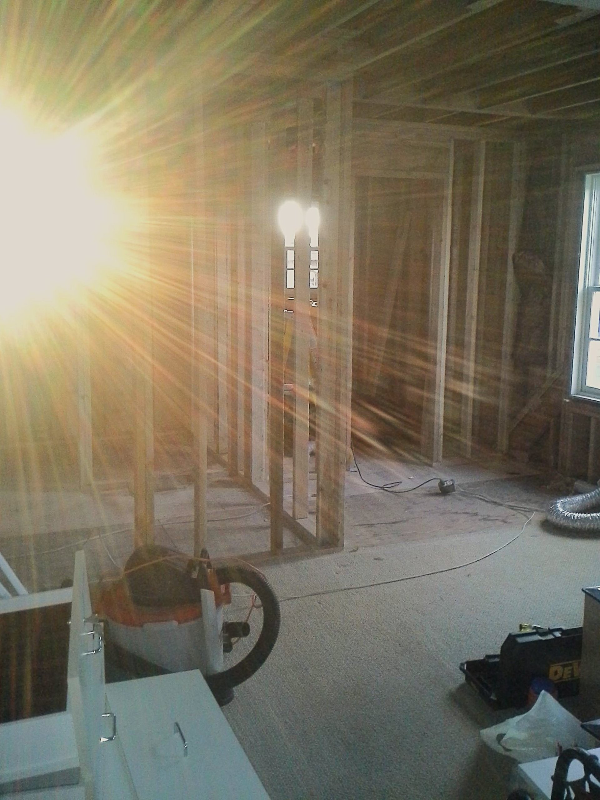 an abstract photo of a curved building with a blue sky in the background