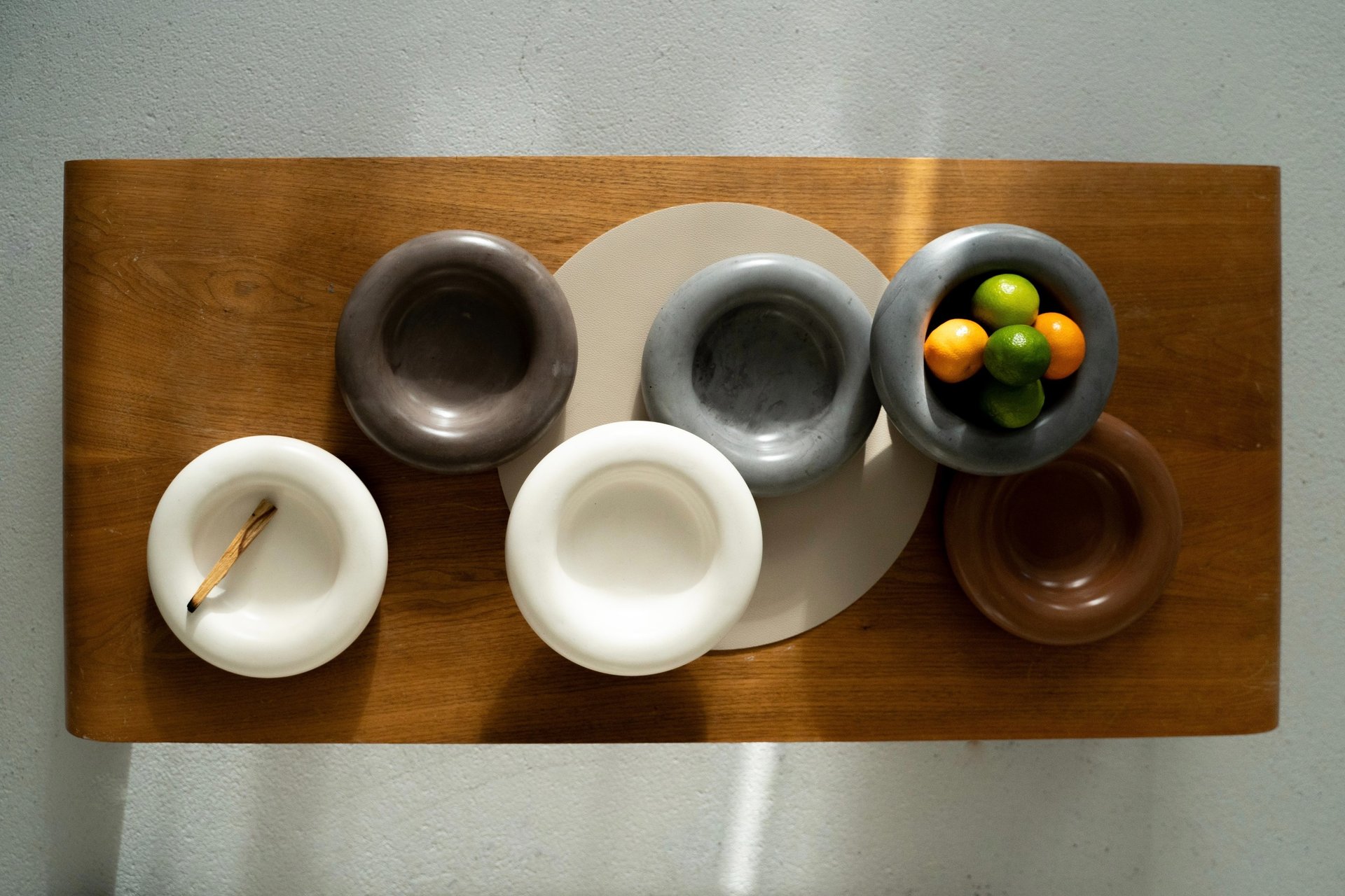 an abstract photo of a curved building with a blue sky in the background