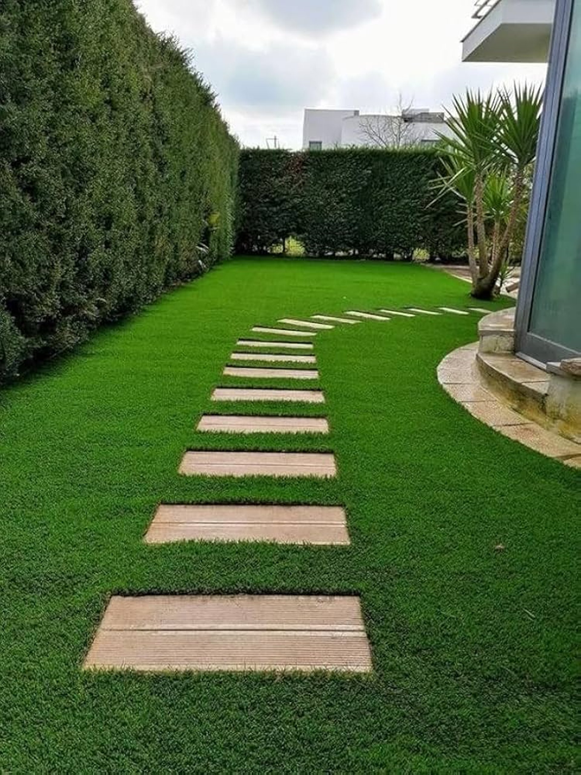 A lush ,durable and kids friendly Bermuda grass lawn at a residential property in Bangalore
