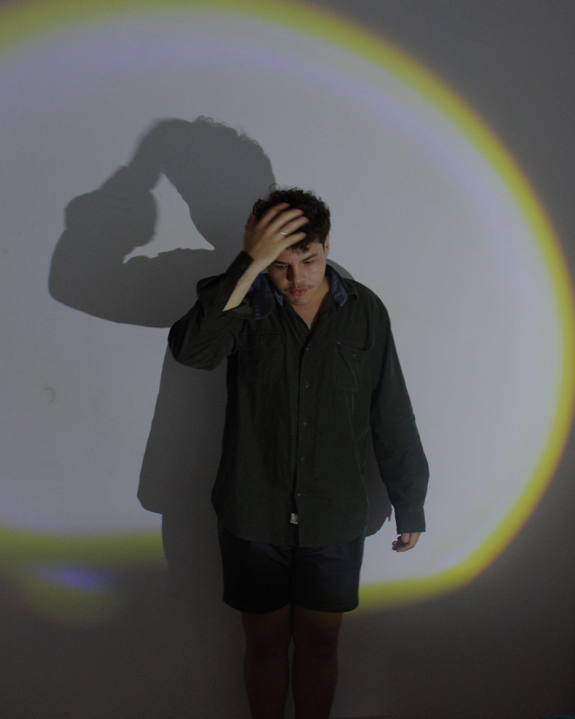 an abstract photo of a curved building with a blue sky in the background