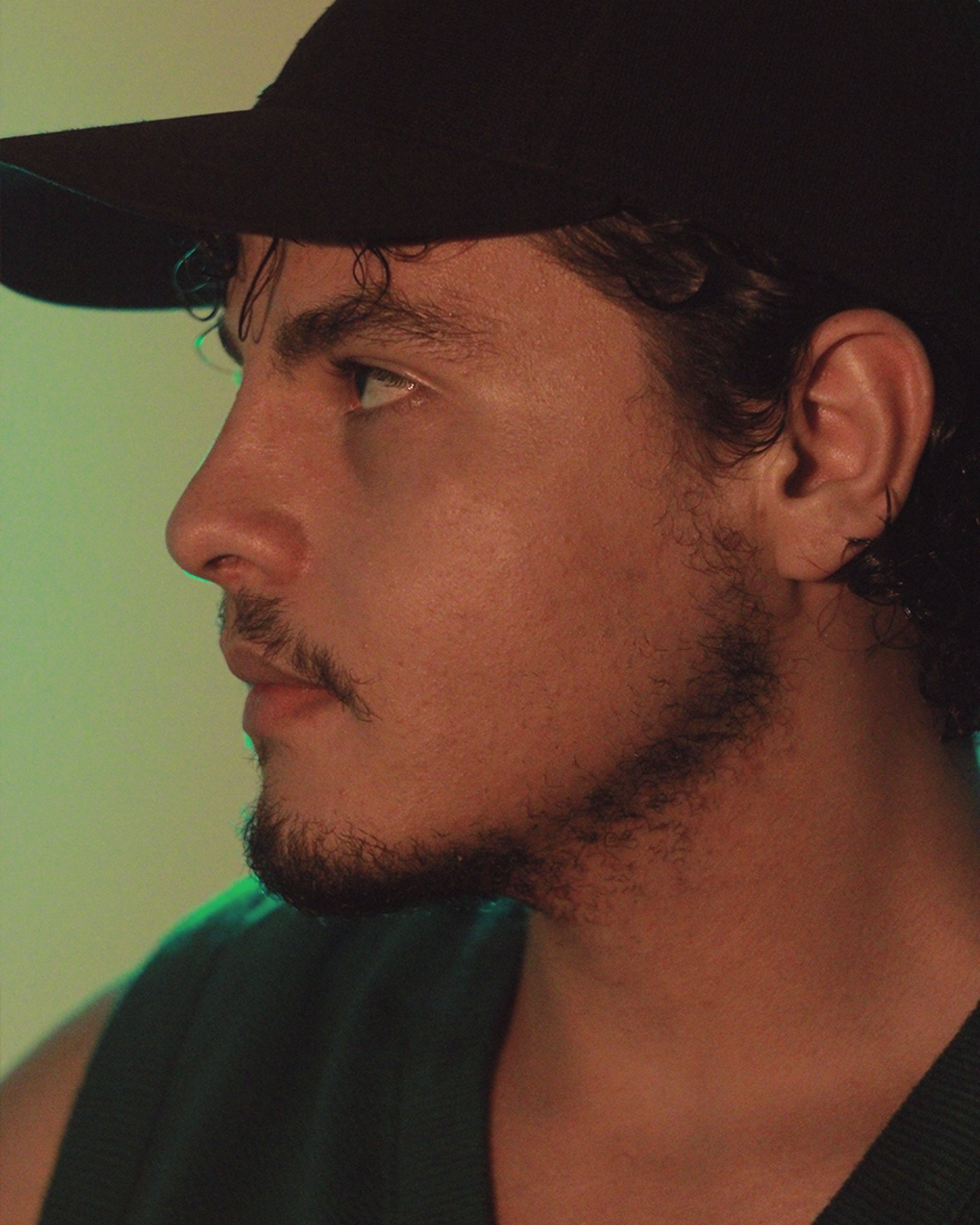 an abstract photo of a curved building with a blue sky in the background