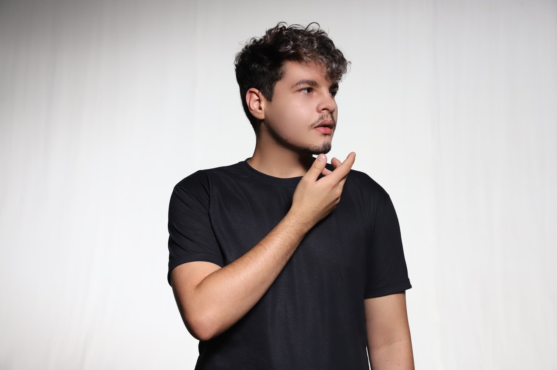 an abstract photo of a curved building with a blue sky in the background