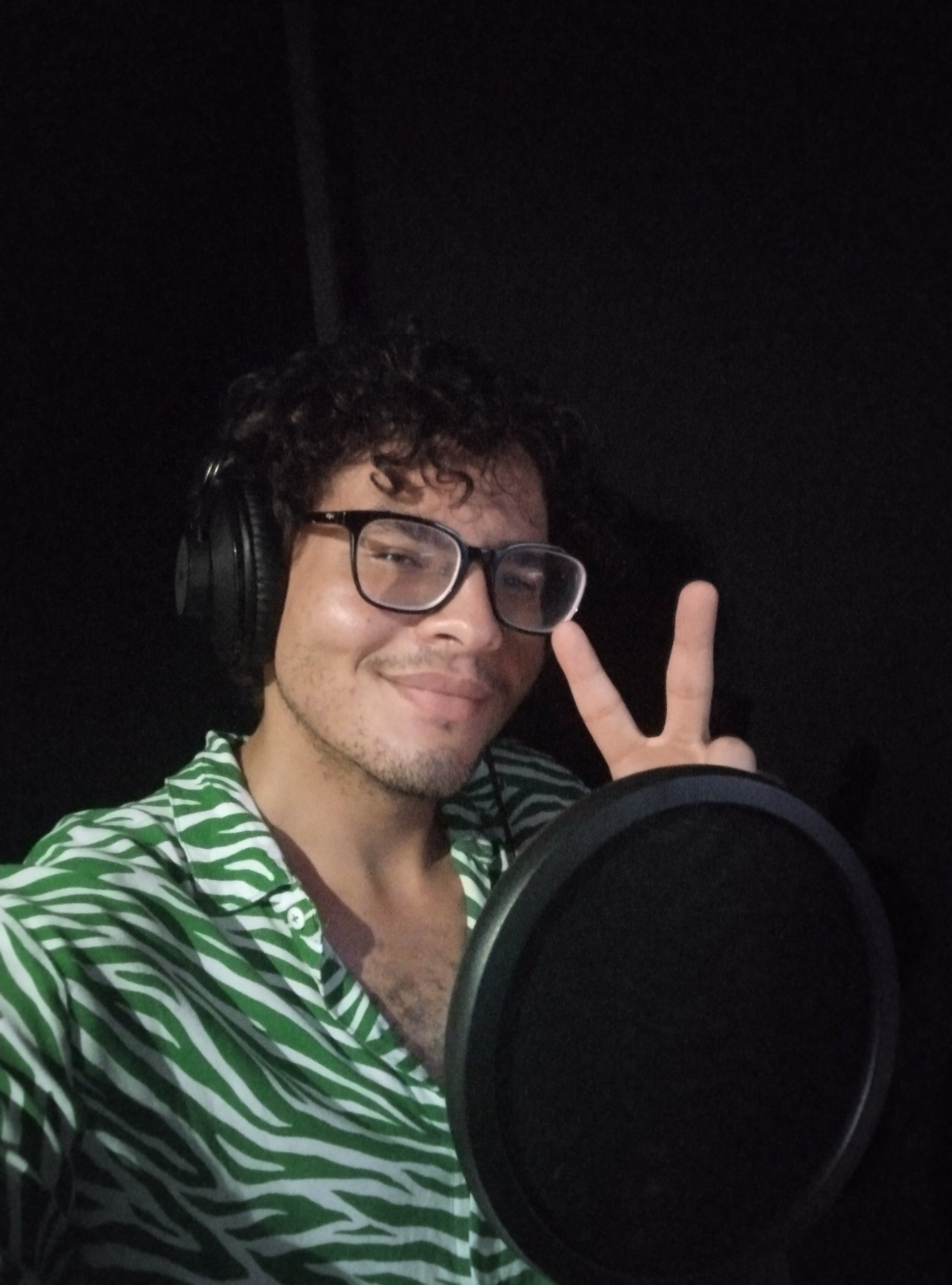an abstract photo of a curved building with a blue sky in the background