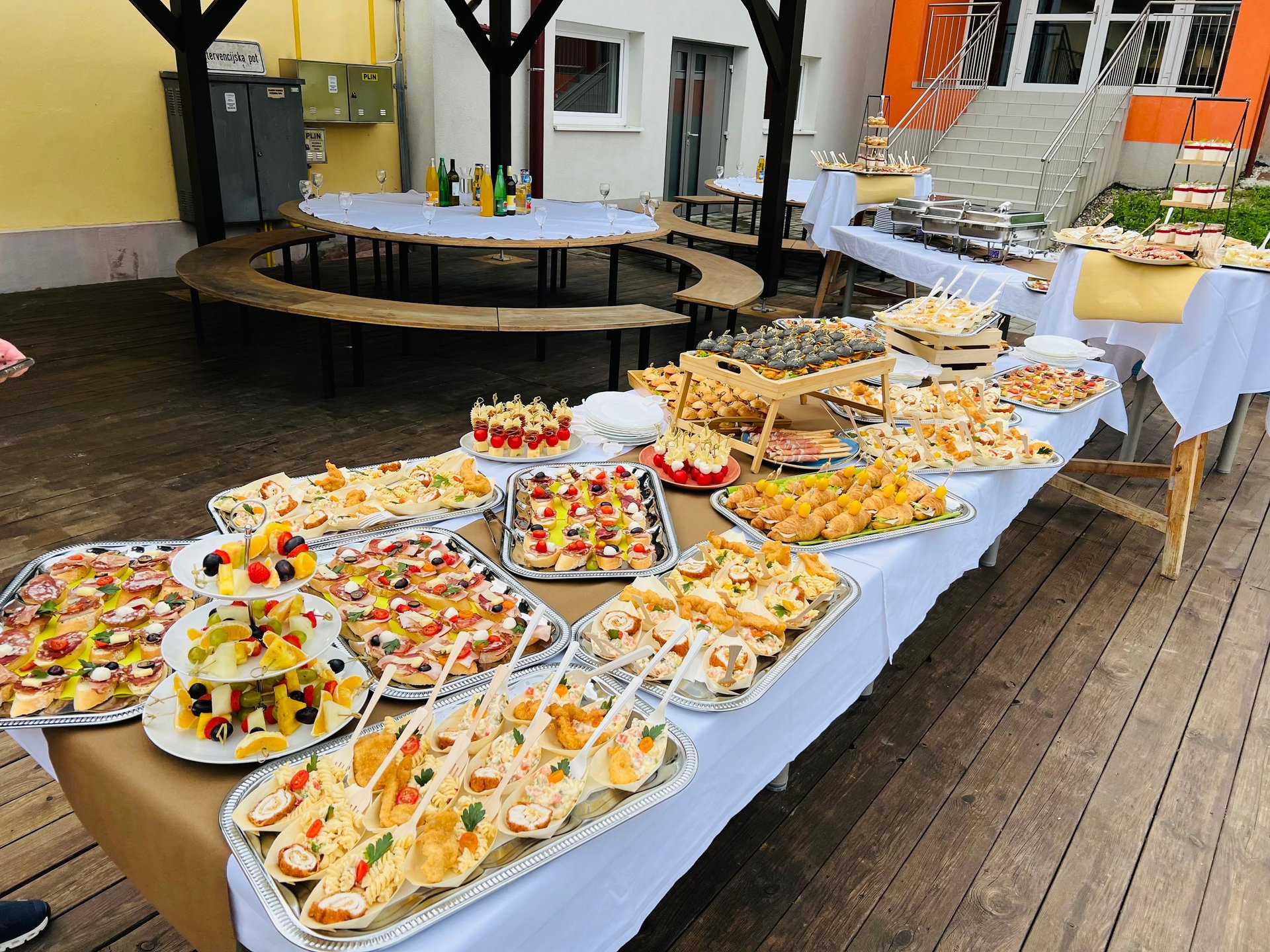 an abstract photo of a curved building with a blue sky in the background